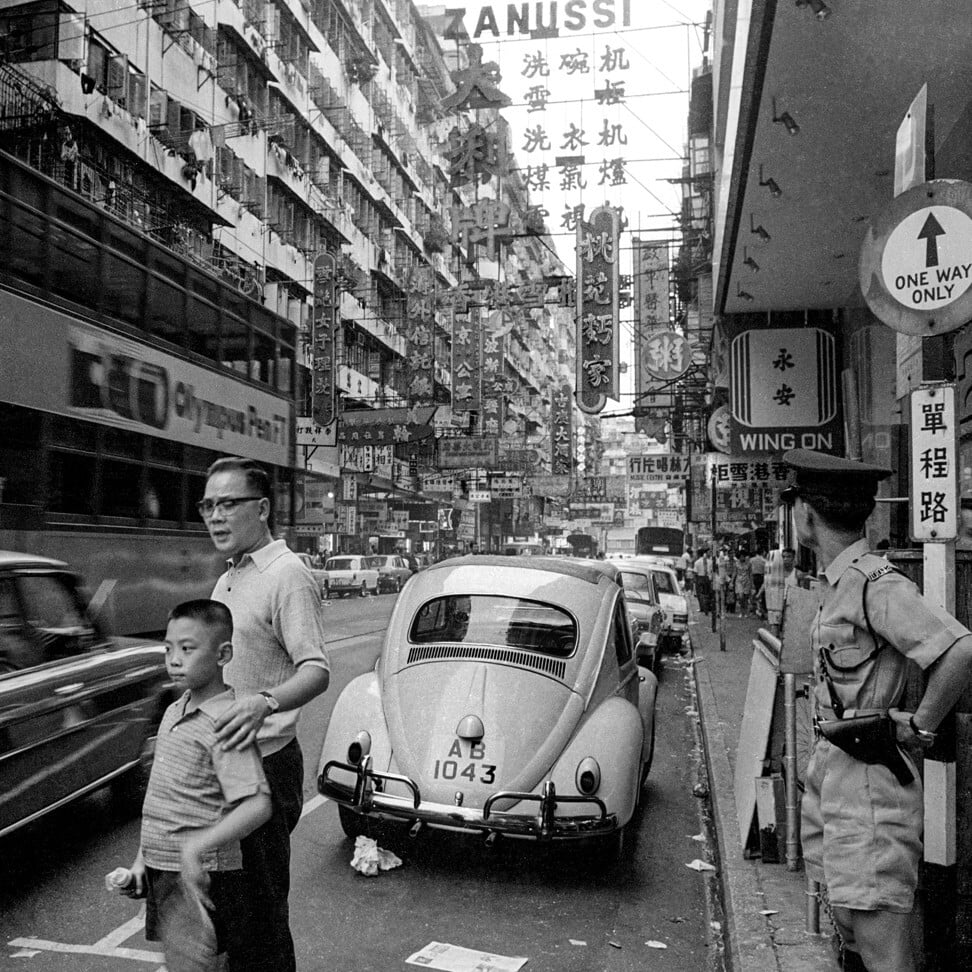 A police officer stands watch on Percival Street in Causeway Bay. Photo: Redge Solley