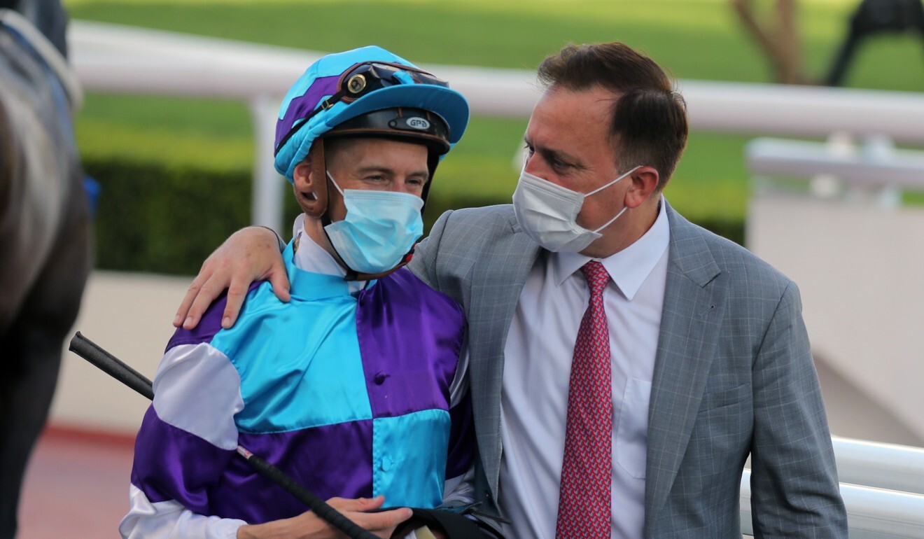 Caspar Fownes gives Blake Shinn a hug after Hall Of Champ’s win.