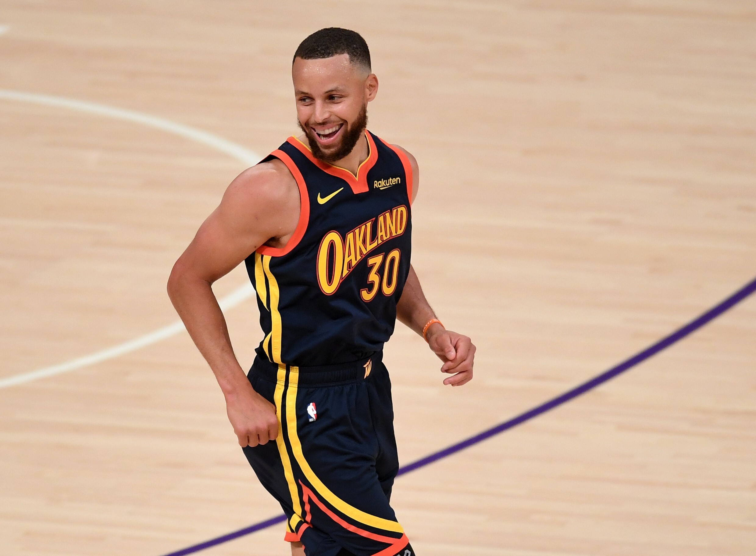 Steph Curry's Bruce Lee NBA-worn shoes raise US$51,000 for Atlanta shooting  victims families