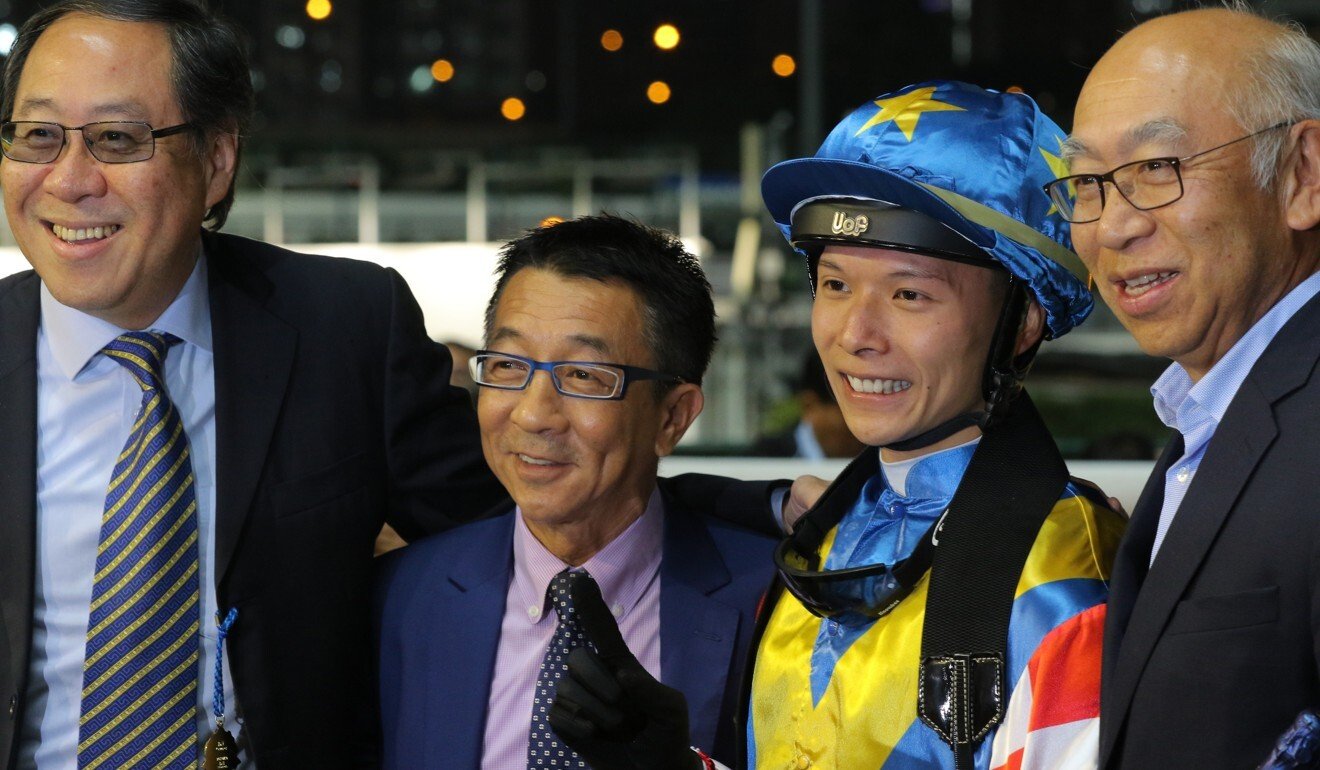 Billy Cheung (left), trainer Me Tsui, jockey Victor Wong and Alex Cheung after a win at Happy Valley.