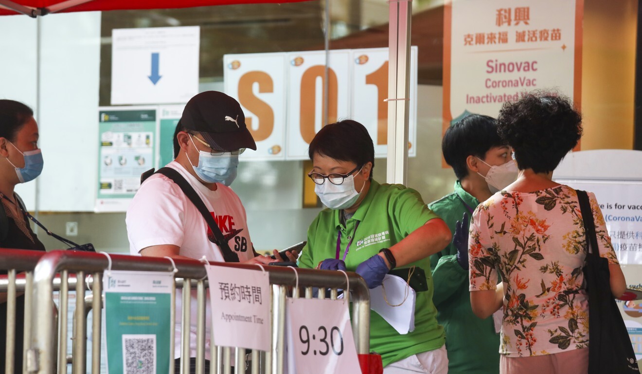 Hongkongers in the queue to get vaccinated at Central Library in Causeway Bay. Photo: Xiaomei Chen