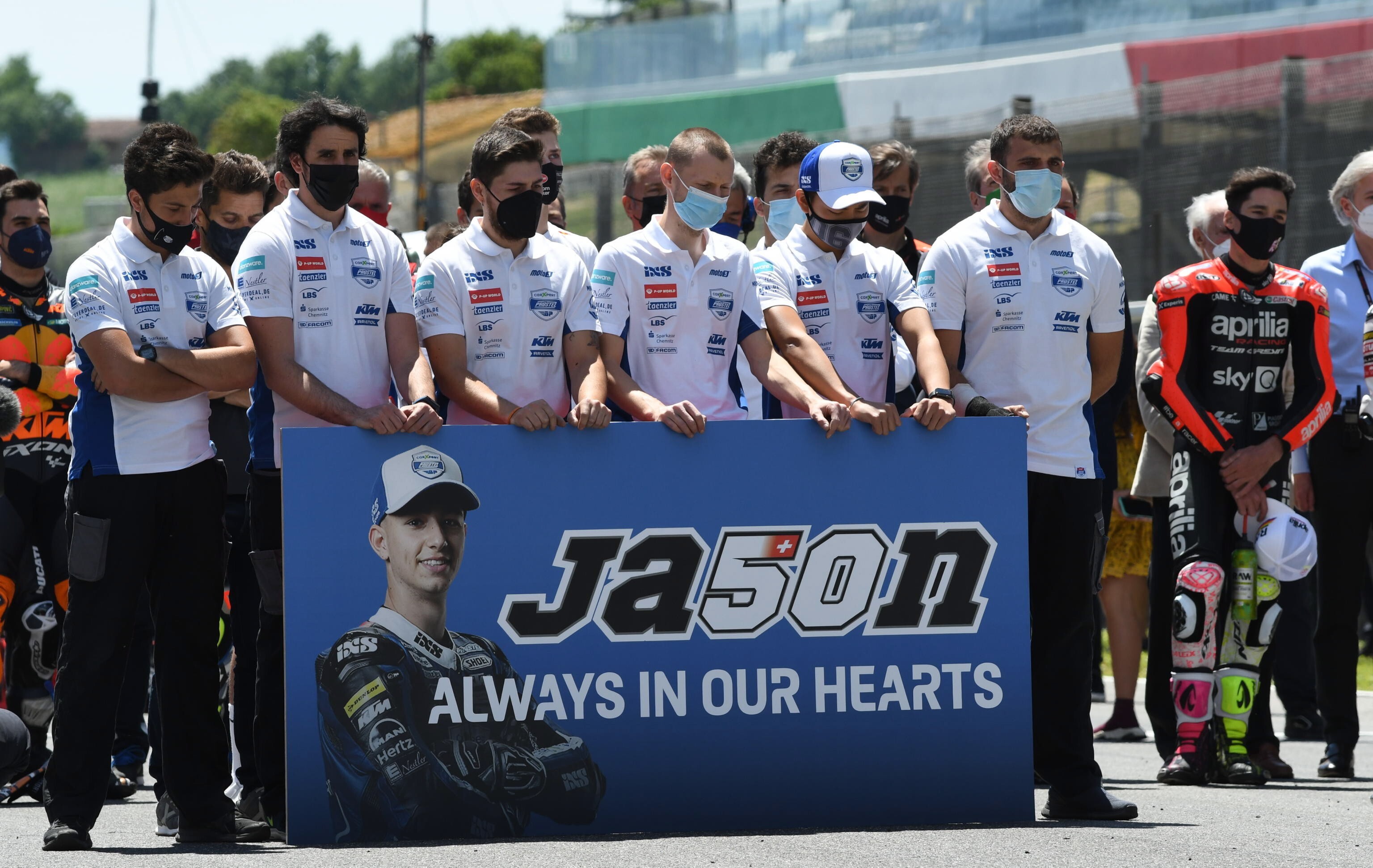 MotoGP riders and teams line up for a one-minute of silence in memory of Jason Dupasquier, who died at the Mugello circuit in Scarperia, Italy on Sunday. Photo: EPA-EFE