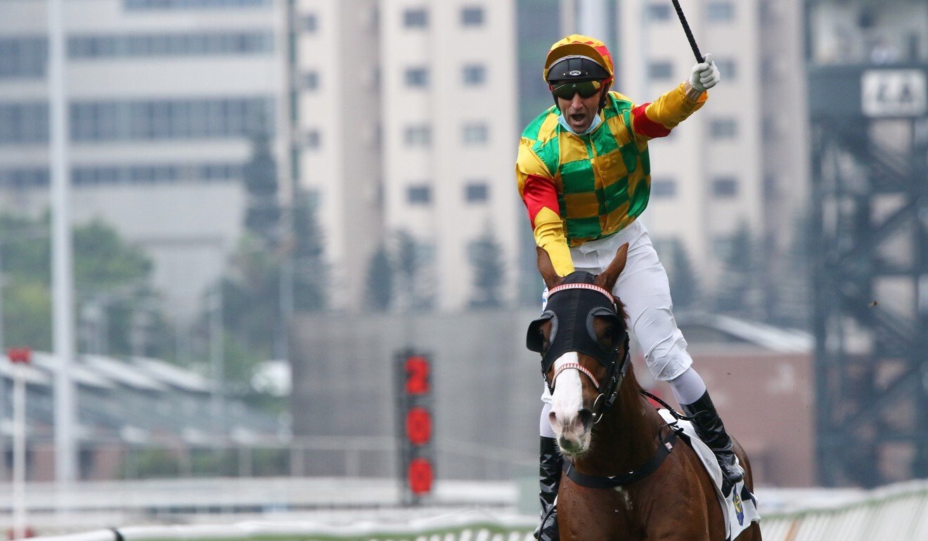 Neil Callan enjoys his win in the Group Two Chairman's Trophy aboard Mighty Giant on April 5.