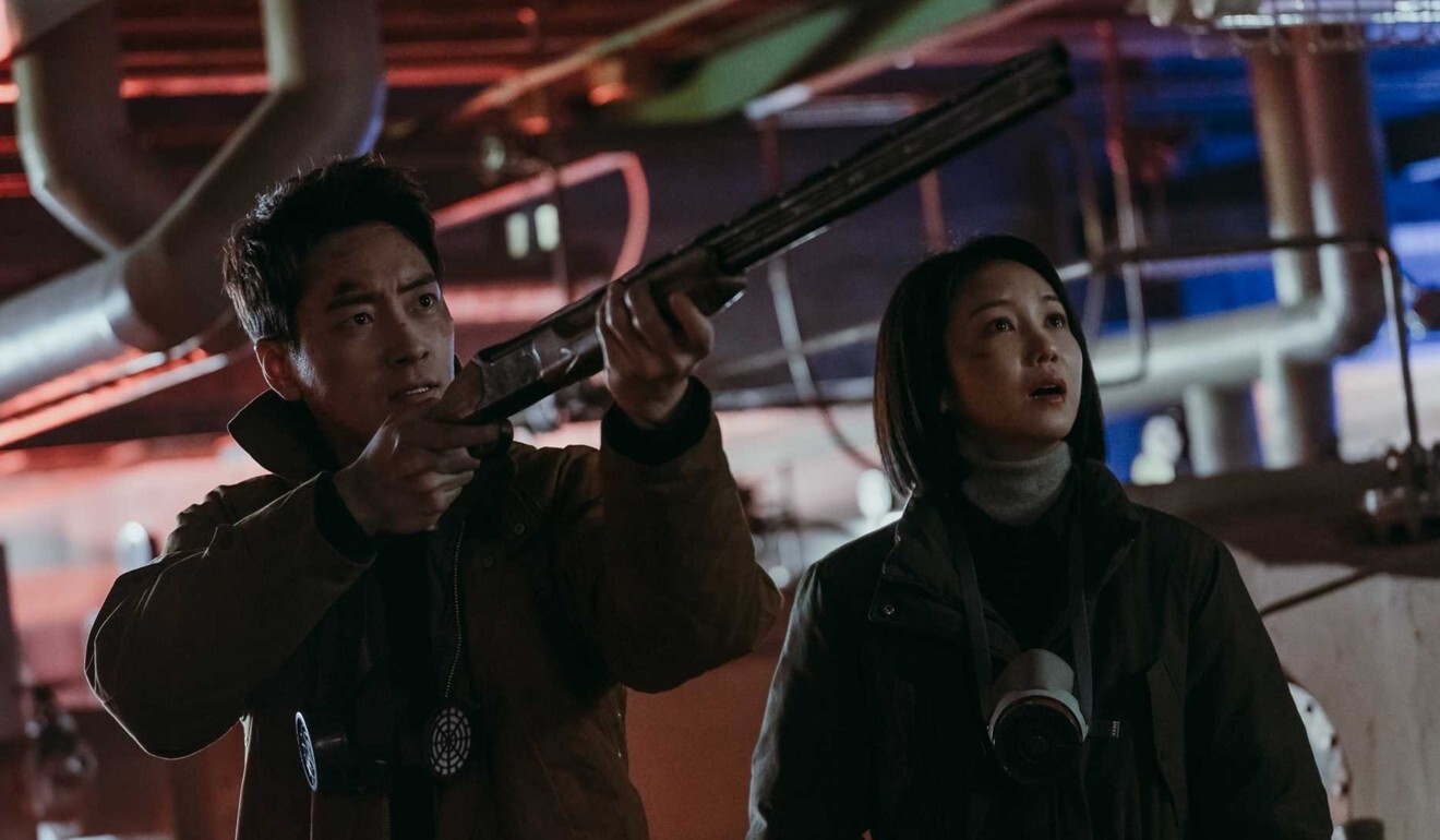 Lee Joon-hyuk (left) and Kim in a scene from Dark Hole.
