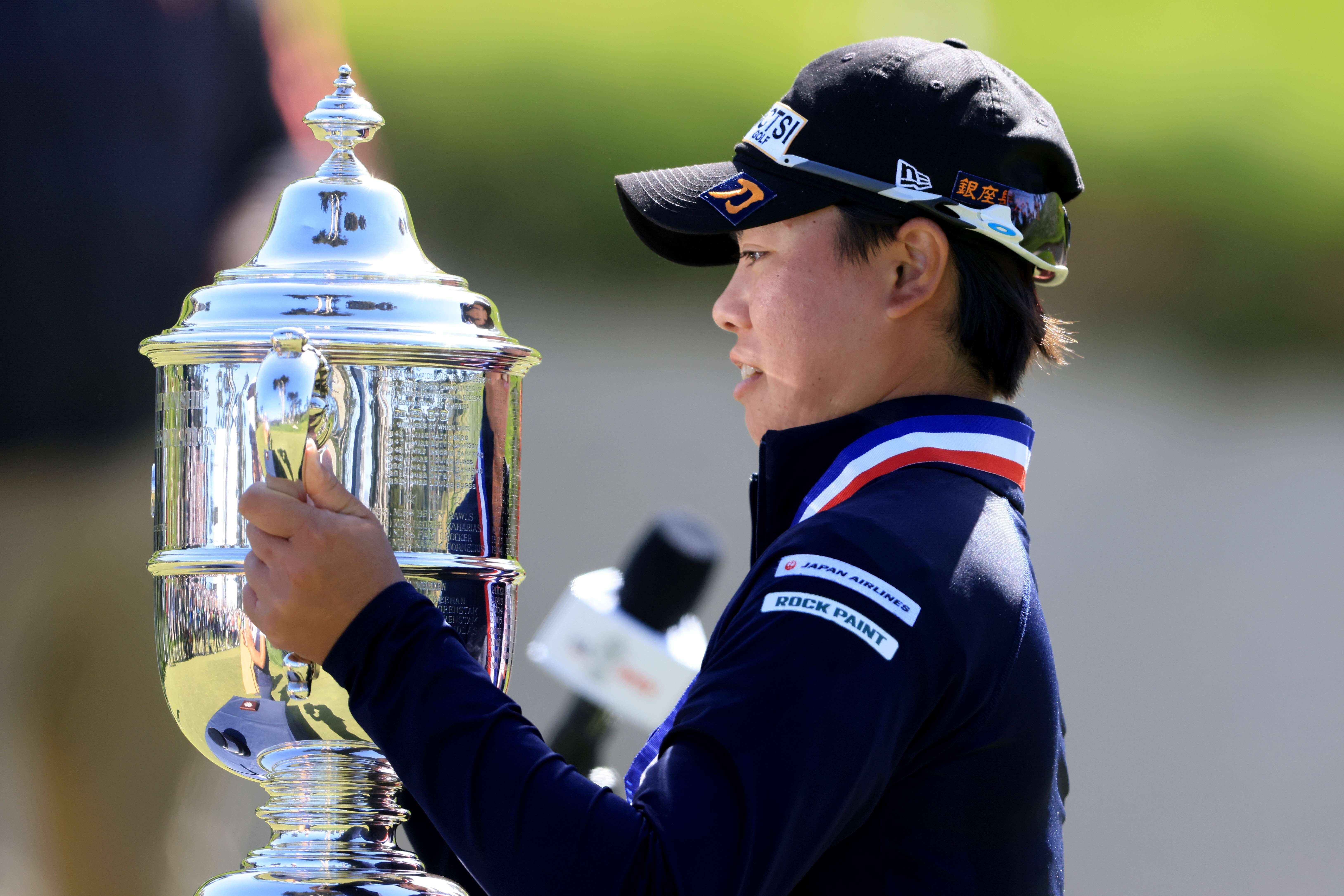 Yuka Saso of the Philippines celebrates with the Harton S. Semple Trophy after winning the 76th US Women's Open Championship at The Olympic Club in San Francisco. Photo: AFP