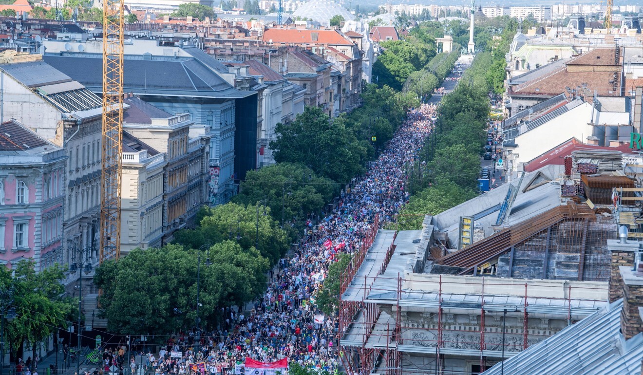 Demonstrators march towards the Hungarian Parliament in Budapest on Saturday. Photo: EPA-EFE