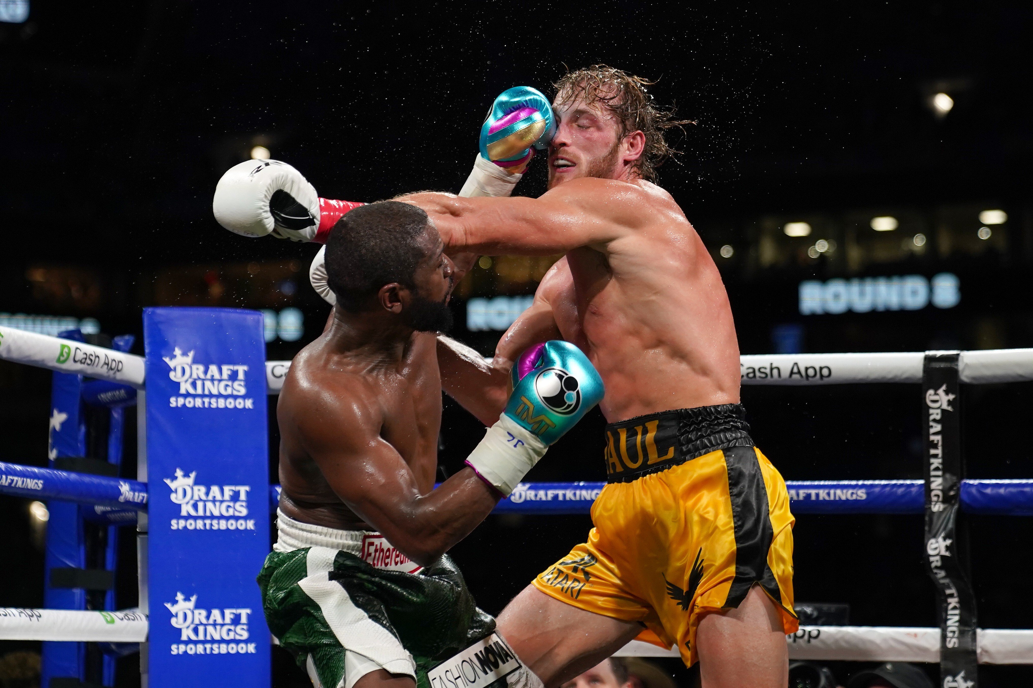 Floyd Mayweather Jnr makes another US$467,250, reportedly, after landing a shot on Logan Paul during their boxing exhibition in Miami, Florida. Photo: USA Today