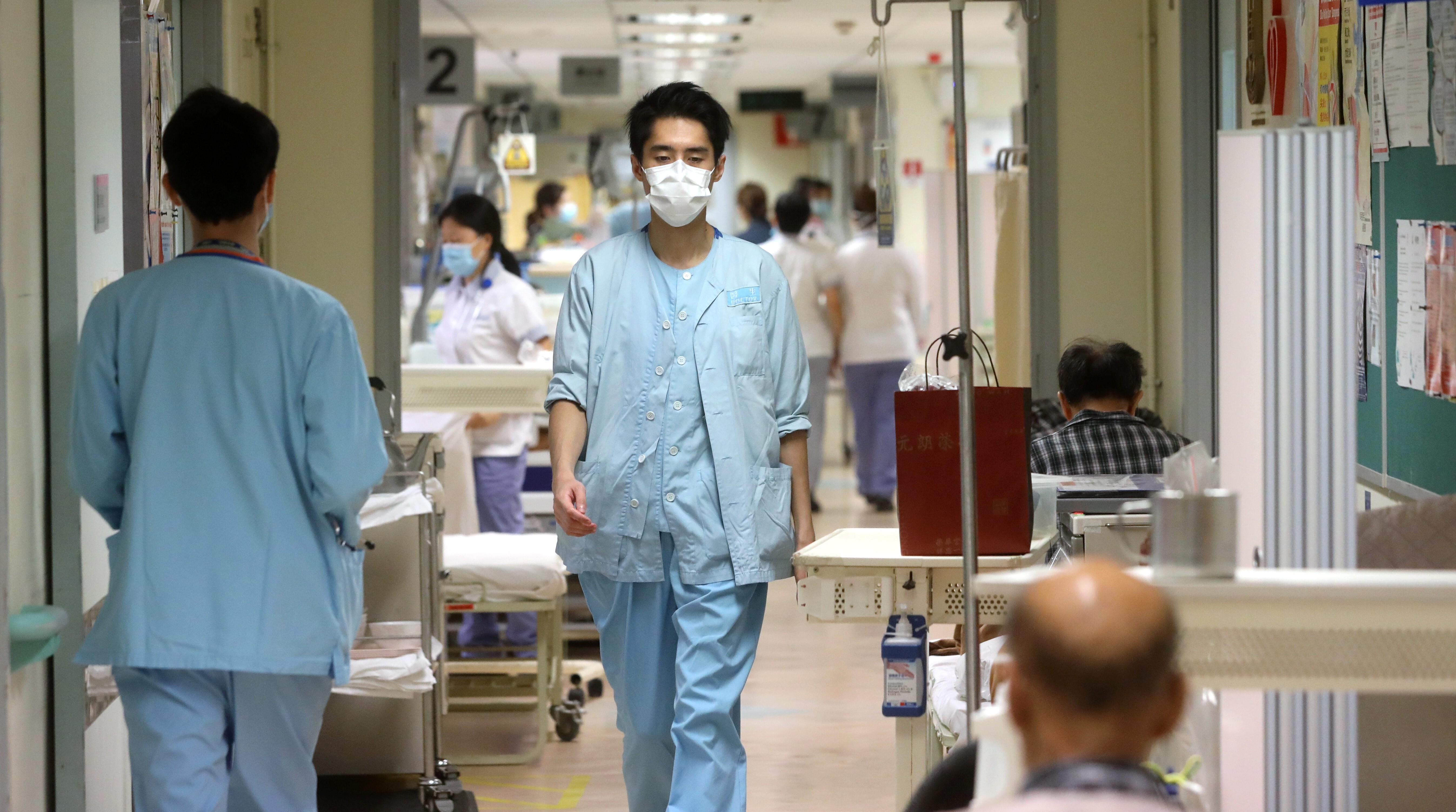 Medical practitioners work in the accident and emergency department of Kwong Wah Hospital in Yau Ma Tei during the winter flu surge in January 2019. Photo: Sam Tsang