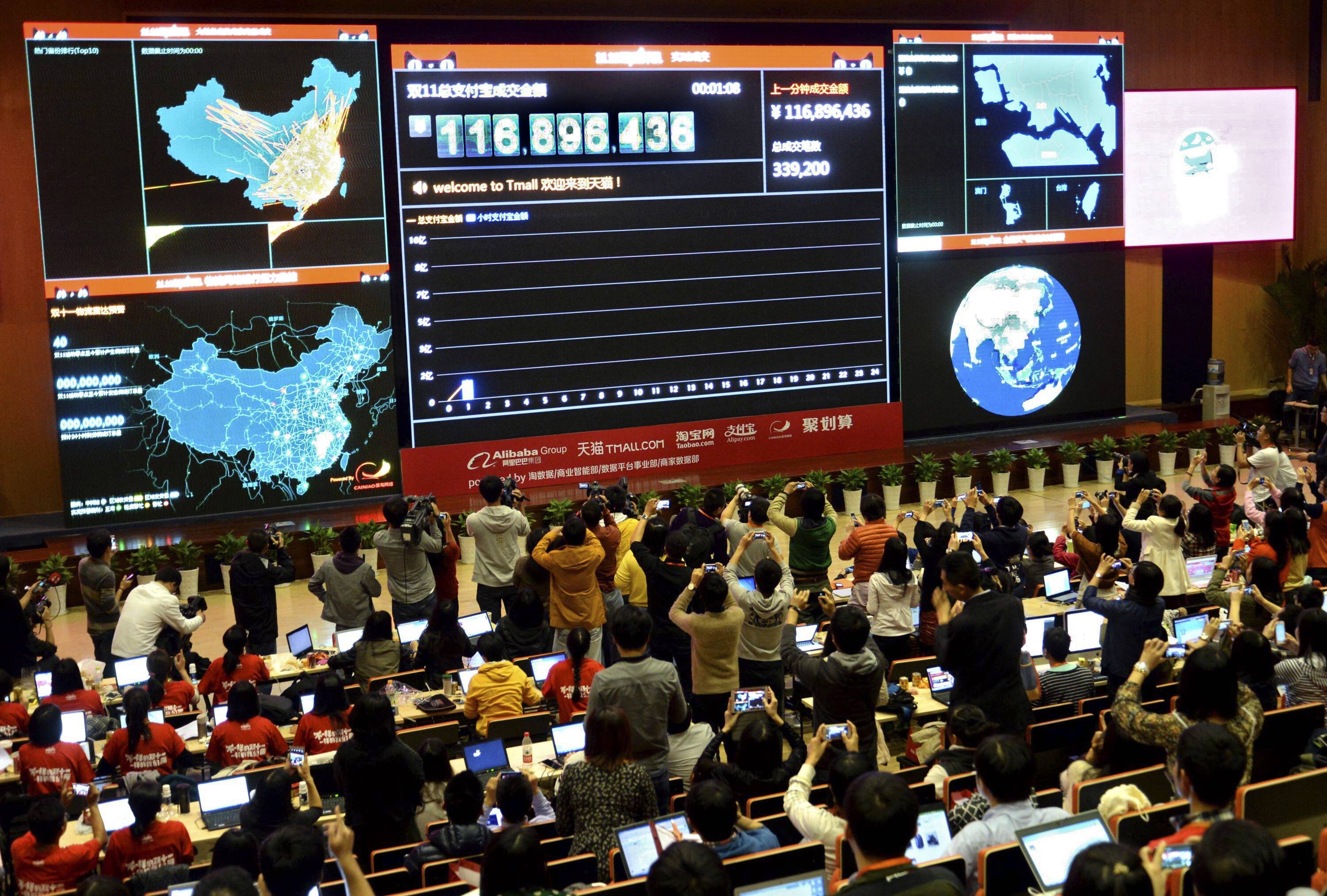 A giant electronic board showing the online transaction value during the annual Singles’ Day sales gala. Photo: Reuters