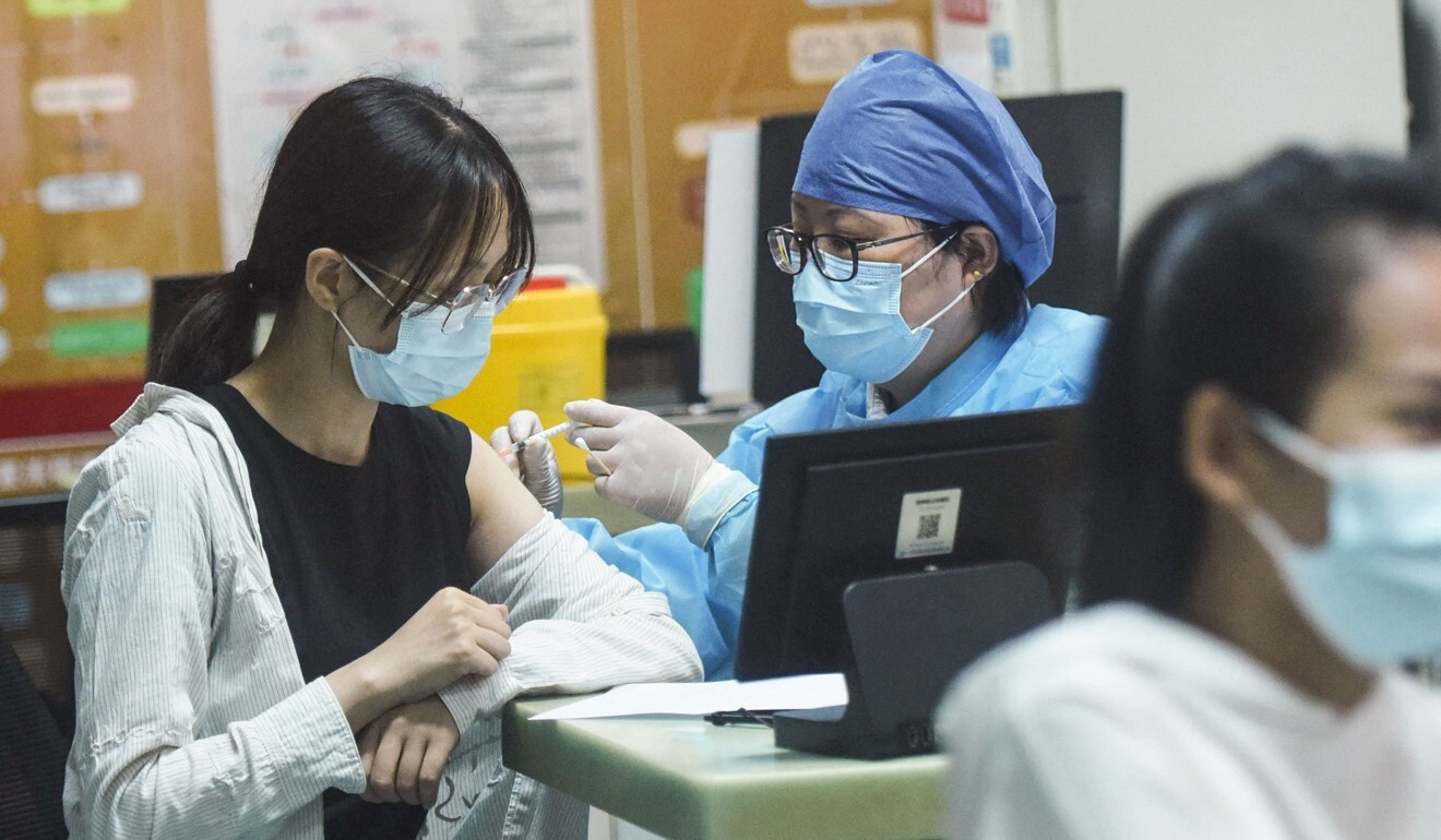 A woman receives a Covid-19 vaccine in Hangzhou, eastern Zhejiang province. Photo: STR/AFP