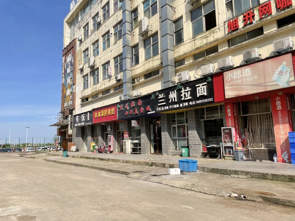 Shops near the dormitory used by Ofilm Group's workers in the Jiangxi provincial capital of Nanchang on June 7, 2021. Photo: Tracy Qu.