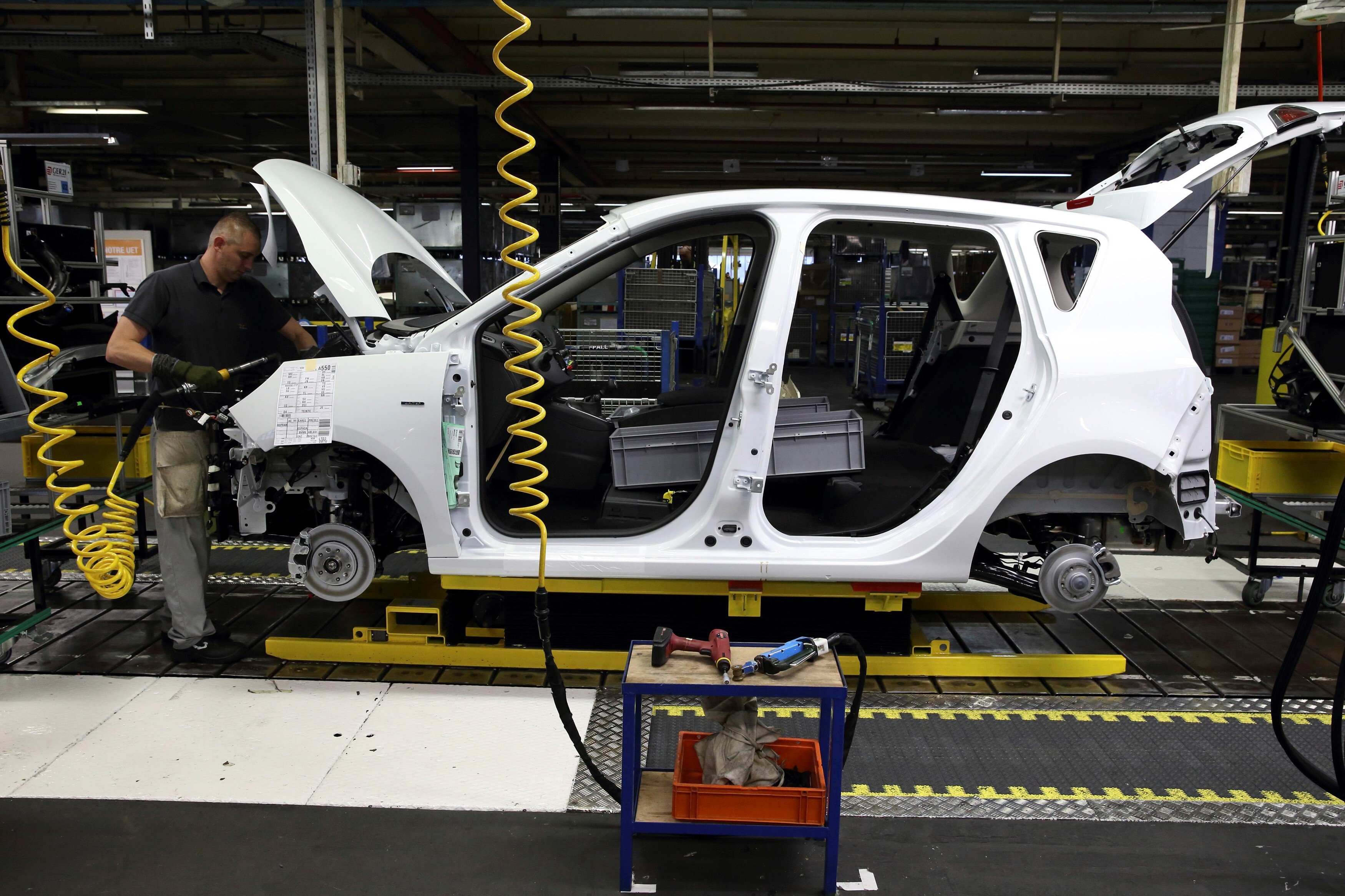 A Renault Scenic on the assembly line at the Renault assembly plant in Douai, northern France. Photo: Reuters
