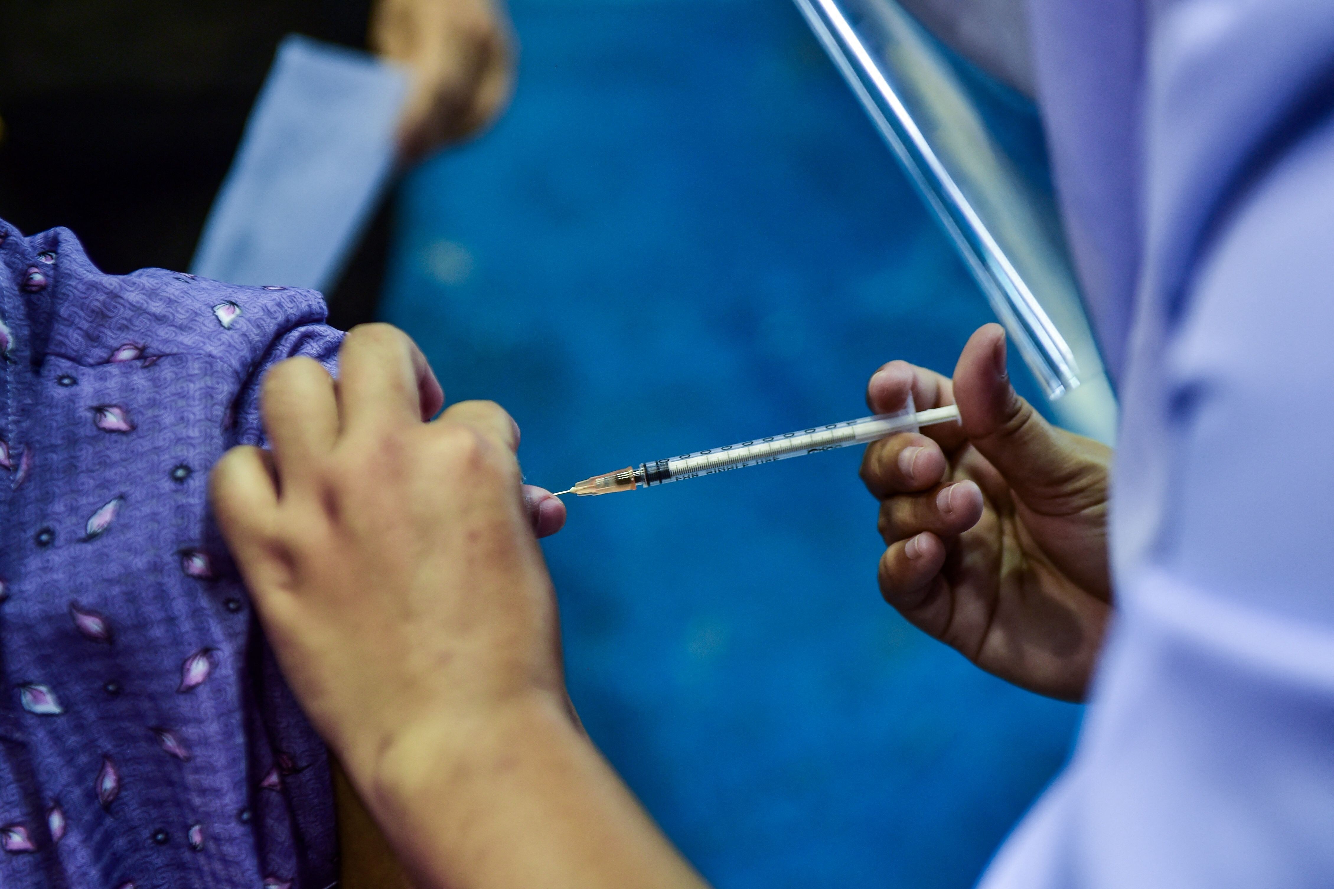 A nurse administers a dose of a Covid-19 vaccine at a hospital in the southern province of Narathiwat on June 7. Less that 5 per cent of Narathiwat and Yala’s 1.1 million population have received a jab so far. Photo: AFP