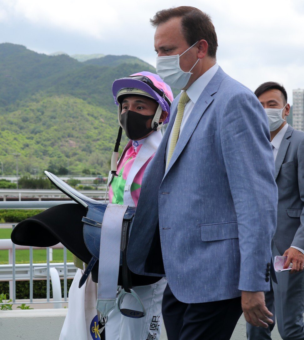 Jockey Alfred Chan and trainer Caspar Fownes discuss Joy Master’s win.