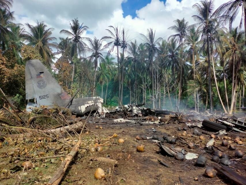 The remains of the Lockheed C-130 plane carrying troops that crashed on landing in Patikul, Sulu province, Philippines. Photo: Reuters