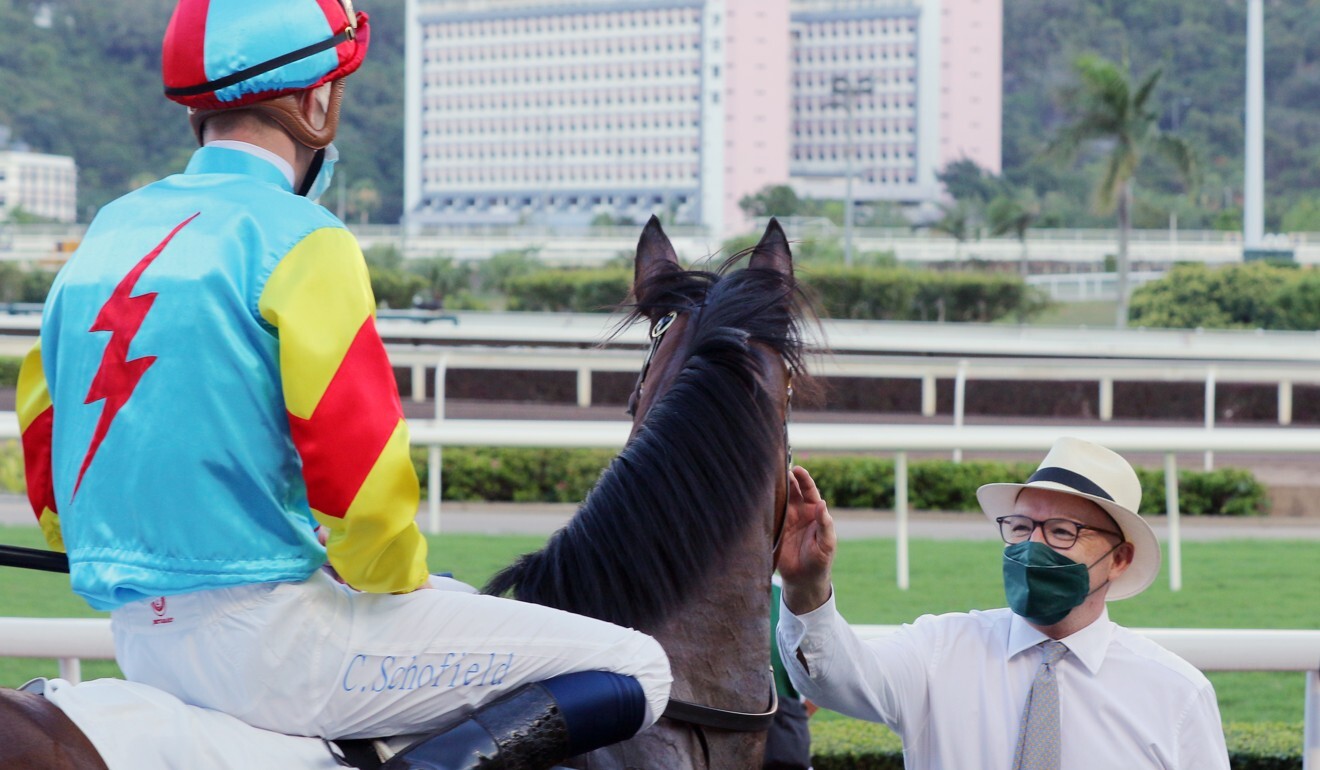 Trainer David Hayes gives the exciting Fantastic Treasure a pat.