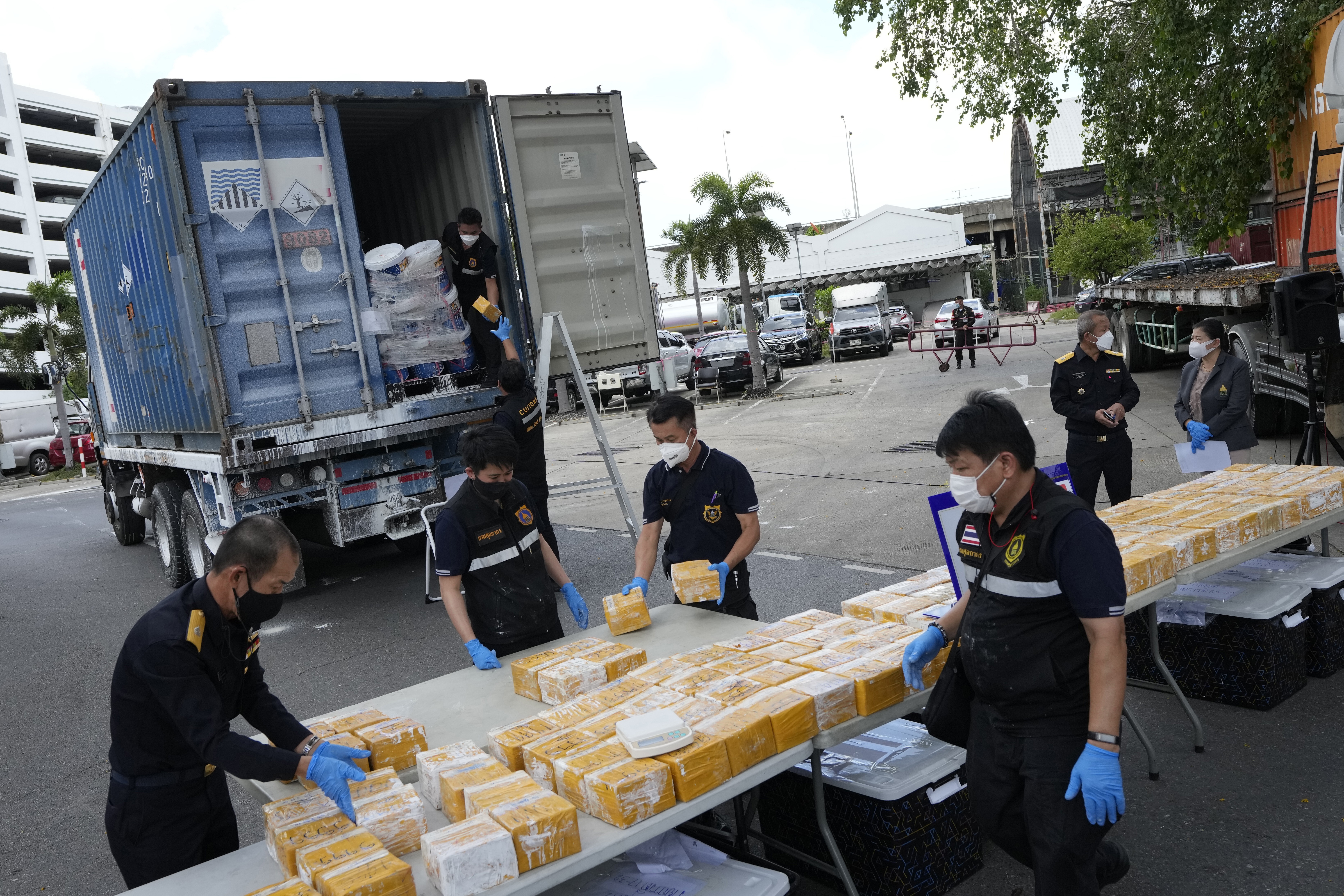 Thai customs officials display seized heroin at the customs headquarters in Bangkok, Thailand on Tuesday. Photo: AP