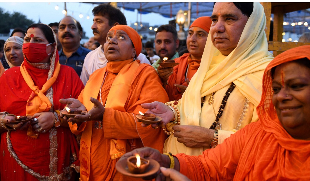 Hindu devotees take part in a prayer ceremony at the Durgiana Temple in Amritsar. Photo: AFP