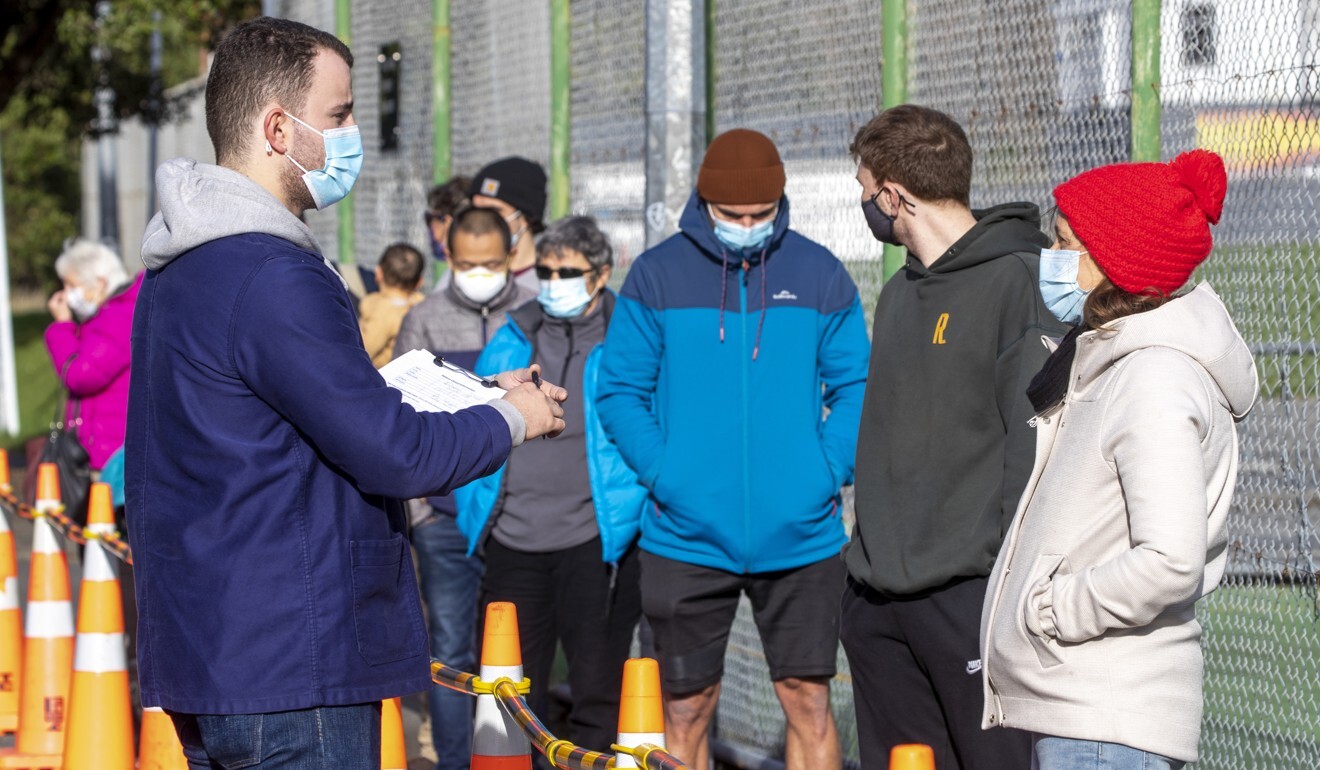 People queue outside a Covid-19 testing station in Wellington, New Zealand. Photo: AP