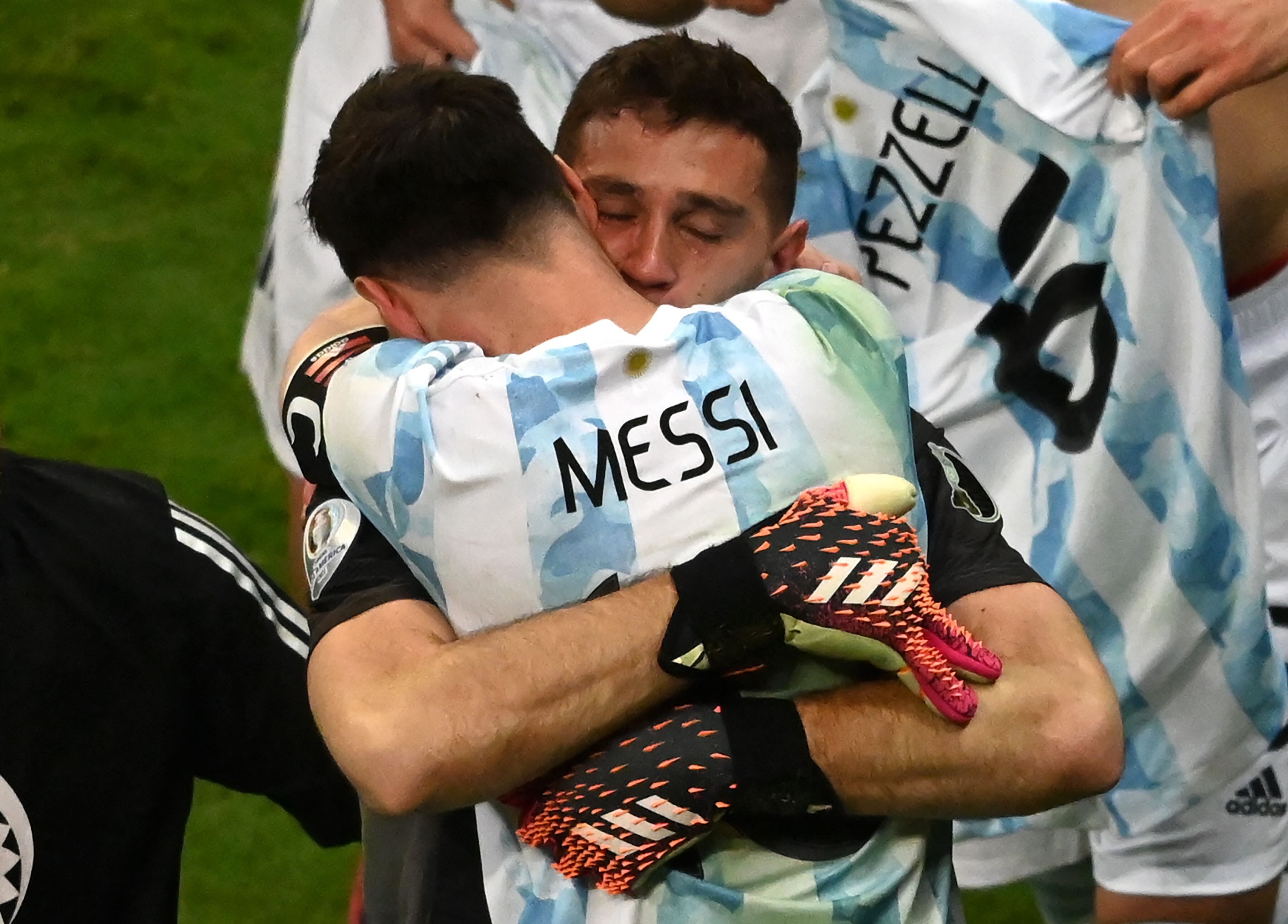 Argentina goalkeeper Emiliano Martinez and captain Lionel Messi celebrate after winning their Copa America semi-final against Colombia in a penalty shoot-out at the Mane Garrincha Stadium in Brasilia. Photo: AFP