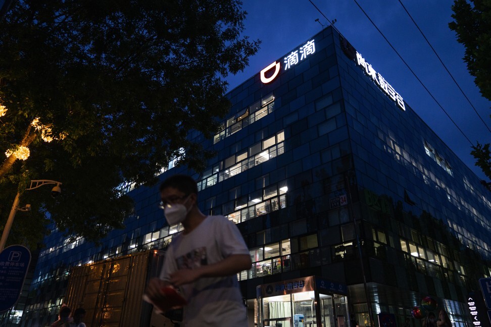 A pedestrian passes the Didi Global Inc in Beijing on Monday. Photo: Bloomberg