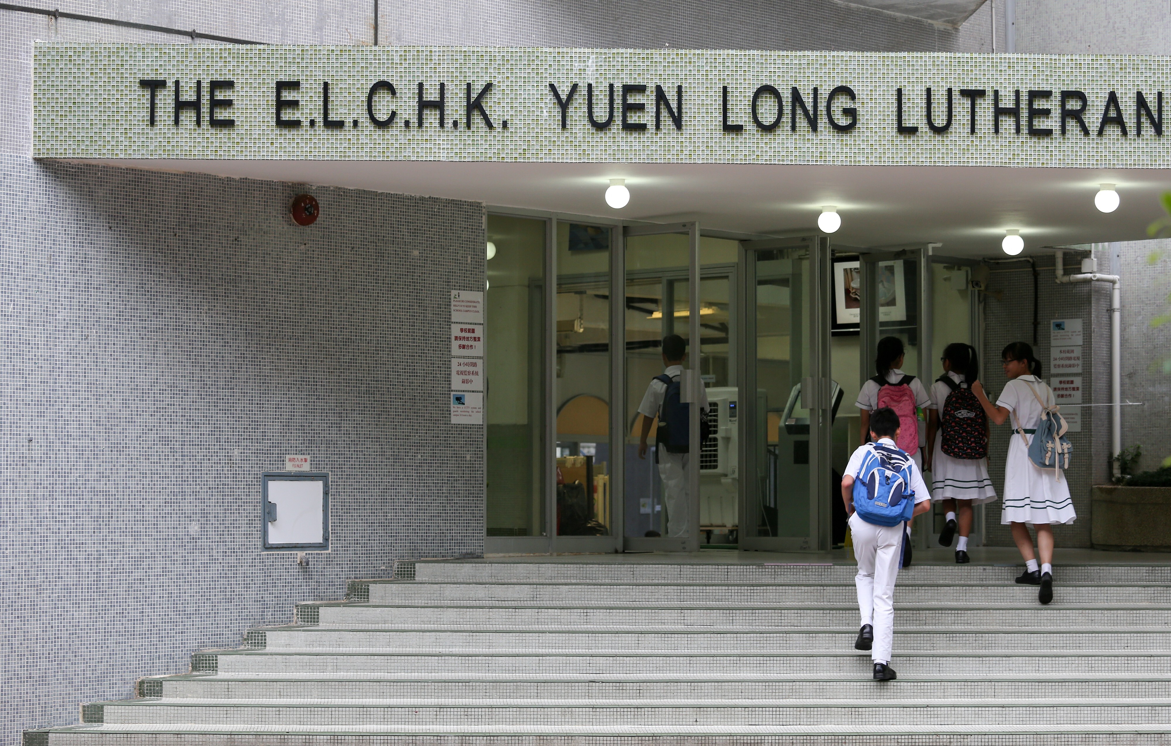 The two students attend the ELCHK Yuen Long Lutheran Secondary School. Photo: K. Y. Cheng