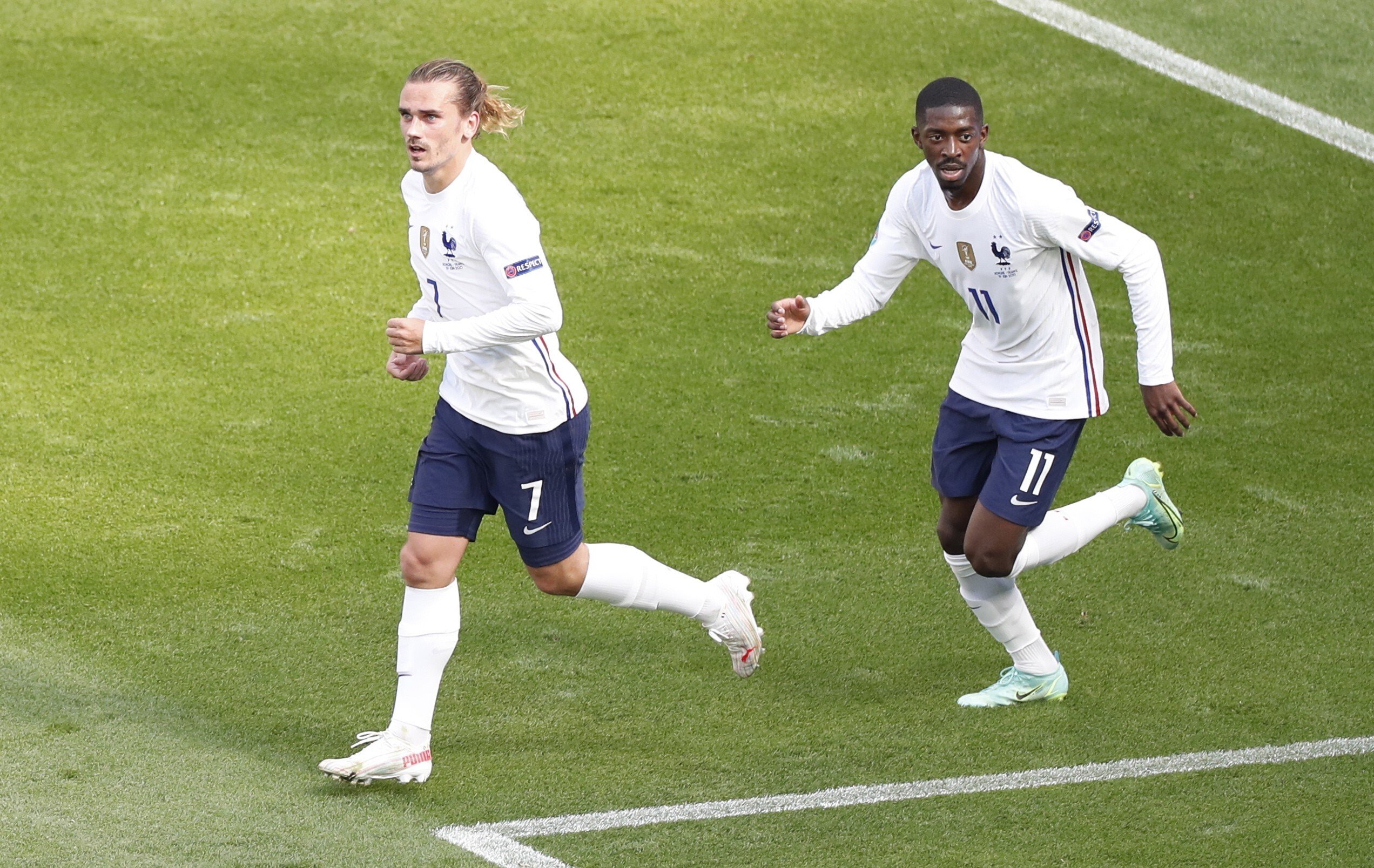Antoine Griezmann (left) of France celebrates with teammate Ousmane Dembele after scoring against Hungary at Euro 2020. Photo: EPA