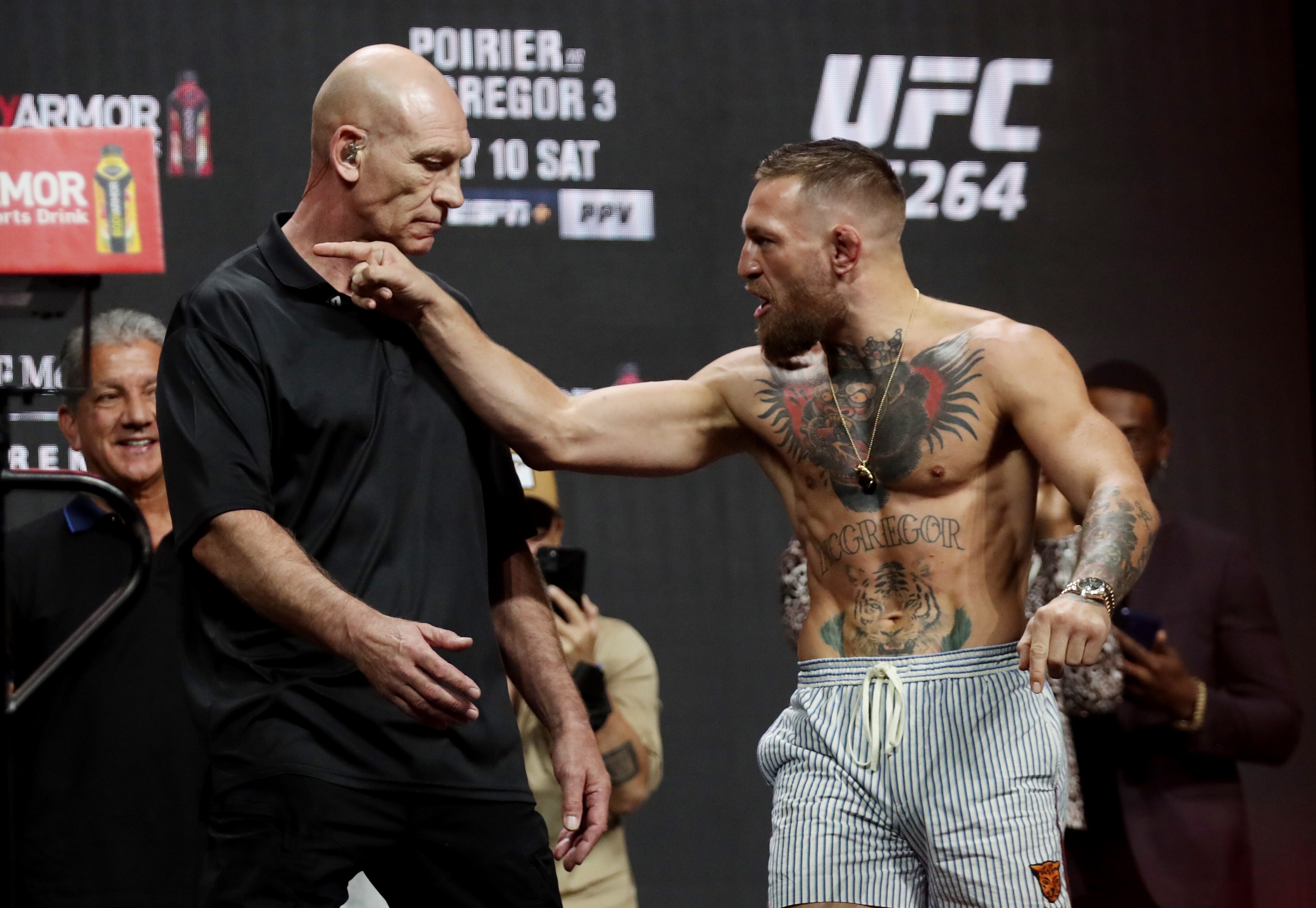 Conor McGregor gestures at Dustin Poirier during the UFC 264 ceremonial weigh-in. Photo: Reuters