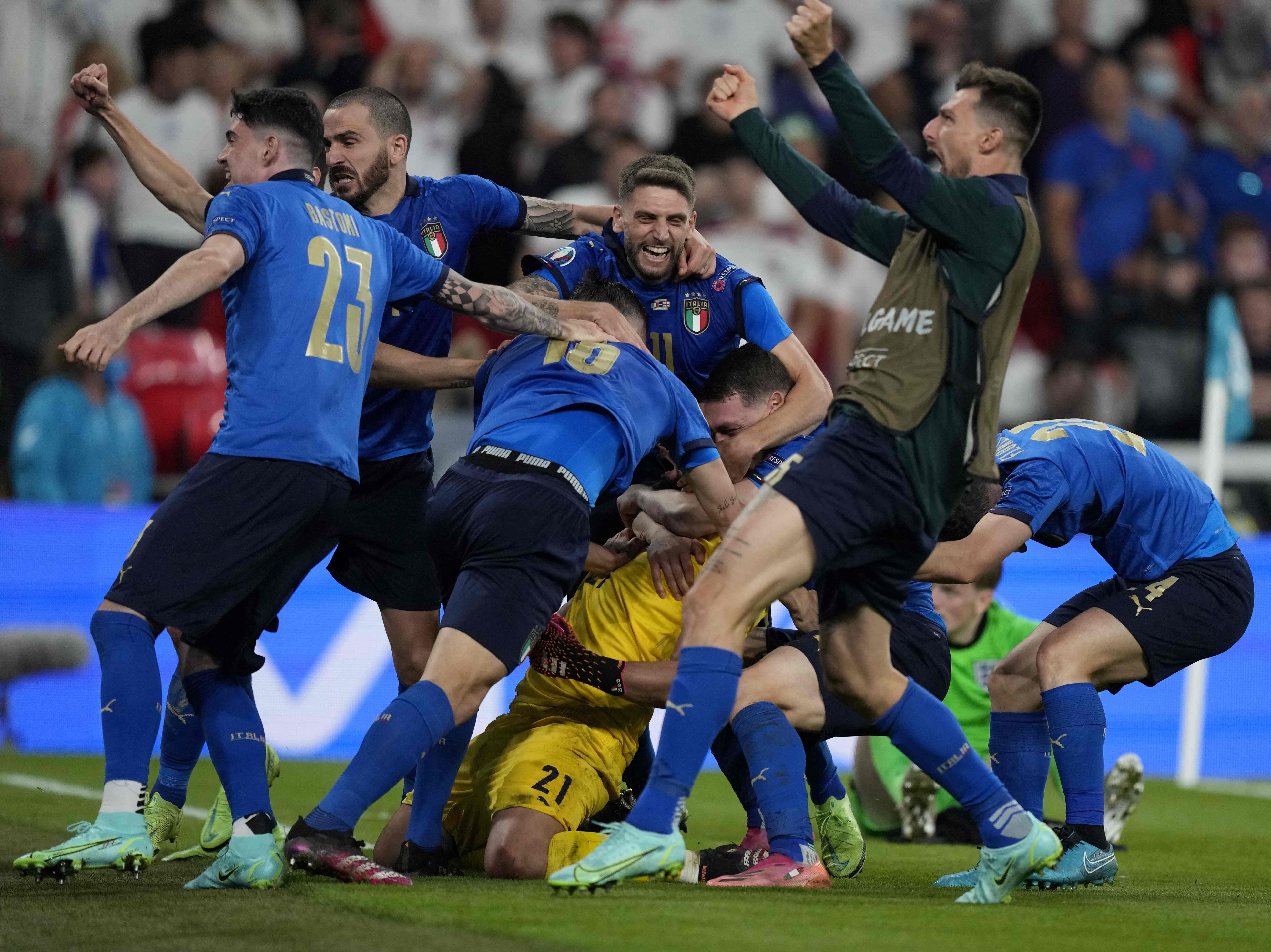 Italy players celebrate after winning the Uefa Euro 2020 final football match between Italy and England at Wembley Stadium in London on Sunday. Photo: AFP
