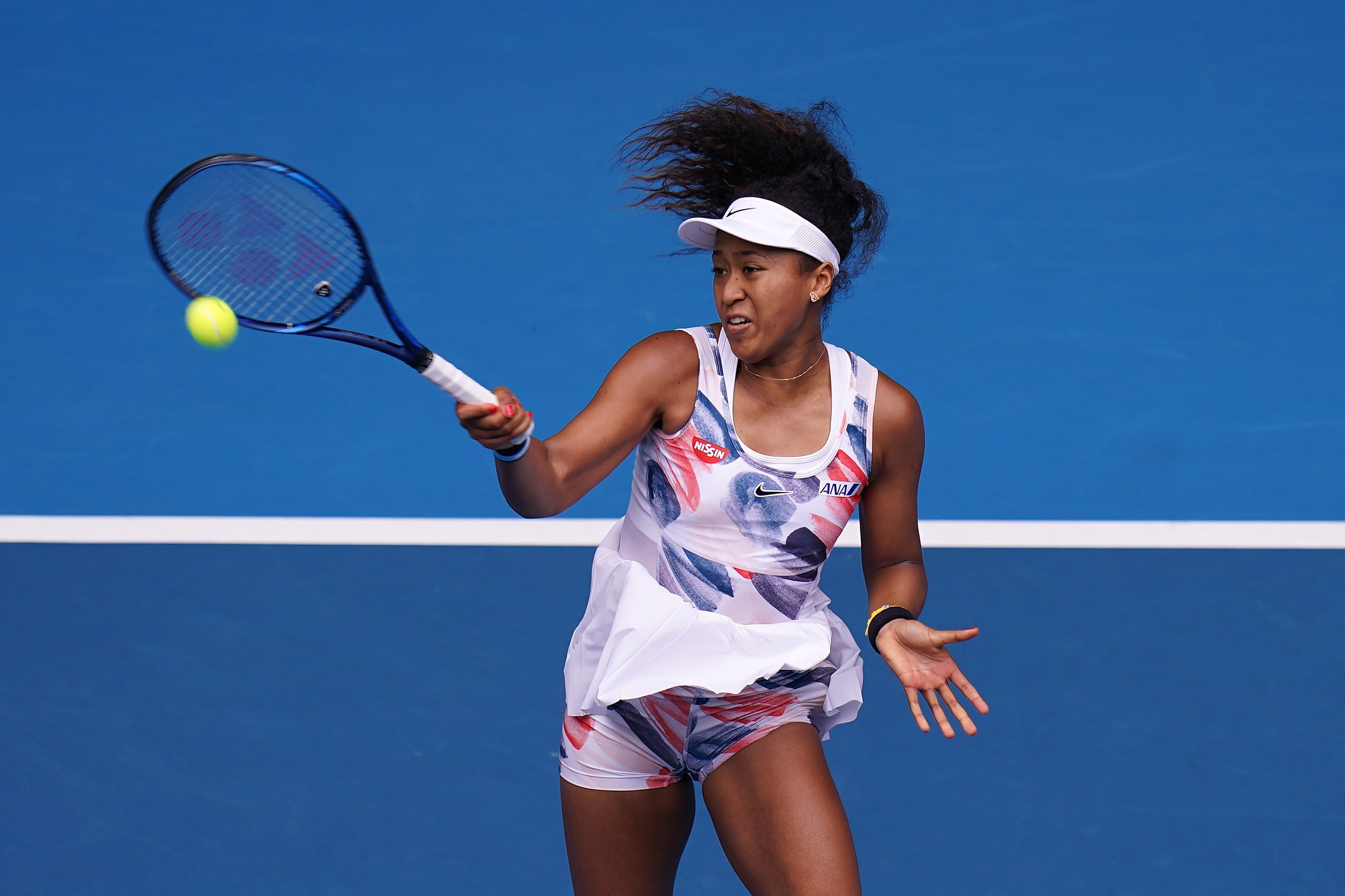 Naomi Osaka in action at the 2020 Australian Open. Her newly released Barbie wears the outfit. Photo: EPA