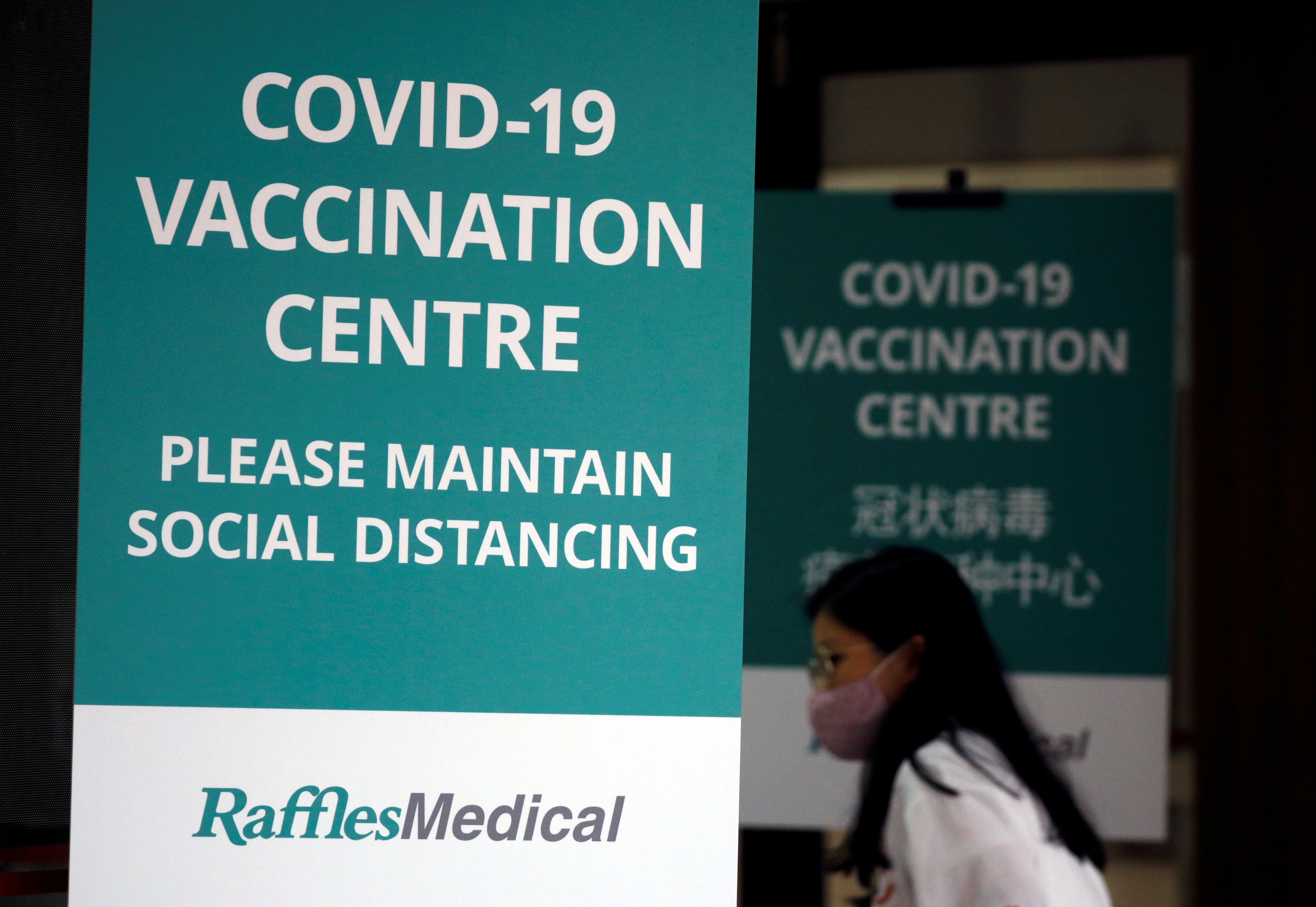 In Singapore, the government offers free jabs from Pfizer-BioNTech and US firm Moderna while residents can pay for Sinovac shots. Photo: Reuters