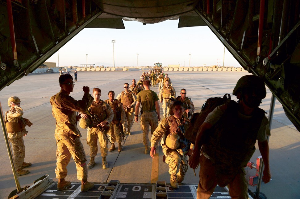 US Marines withdraw from the Camp Bastion-Leatherneck complex in Helmand in 2014. Photo: AFP