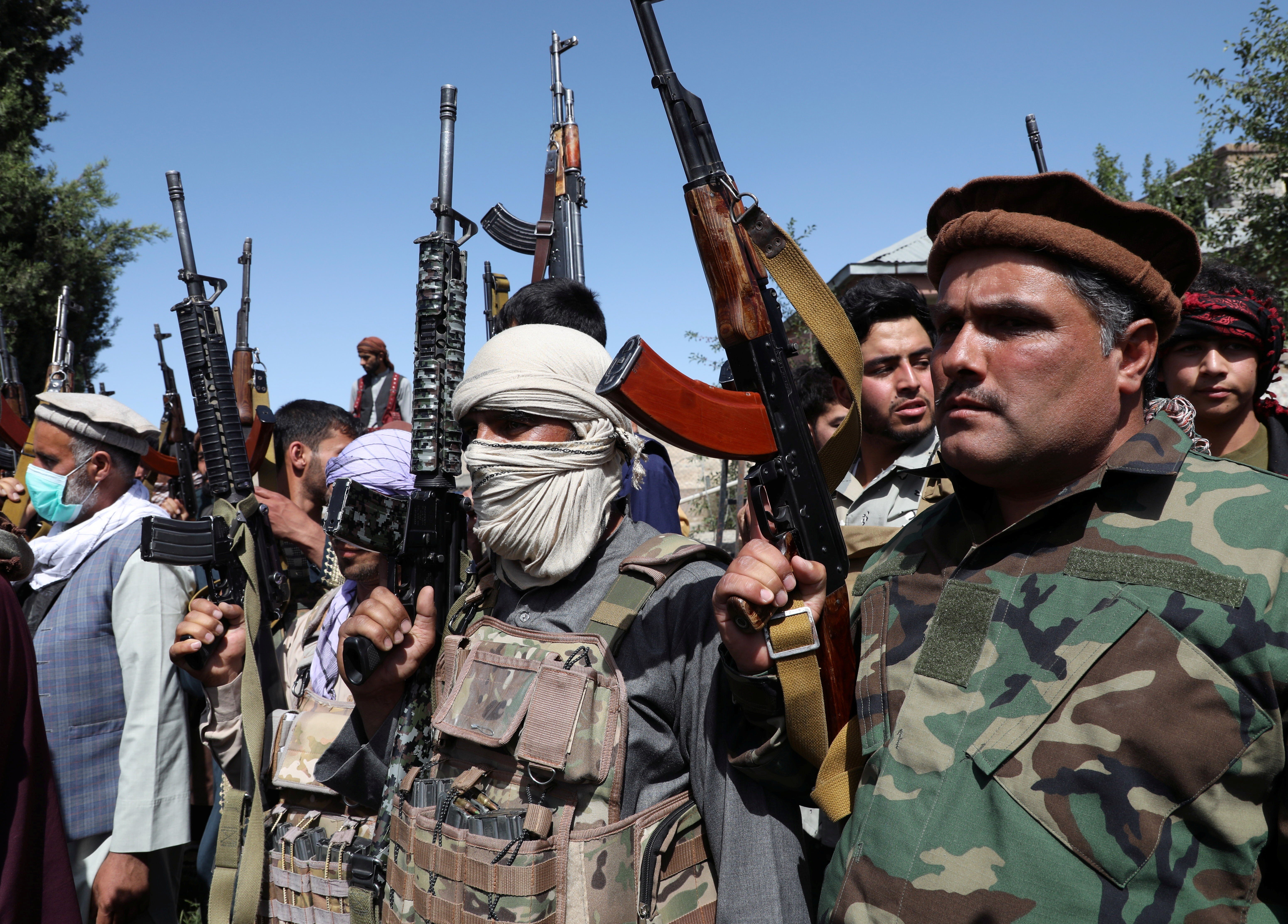 Armed individuals gather to pledge their support for Afghan security forces and fight against the Taliban. Photo: Reuters