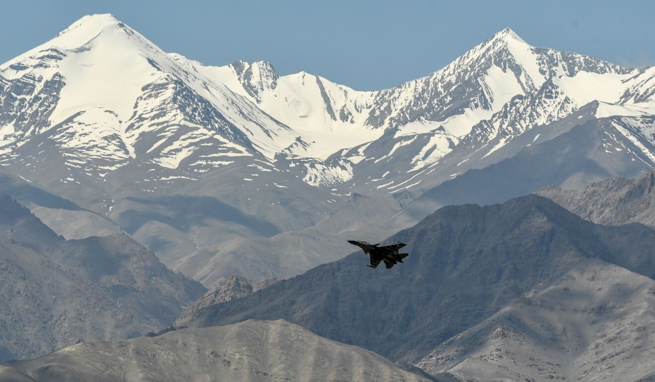 An Indian Air Force aircraft is seen against the backdrop of mountains surrounding Leh, Ladakh. Photo: AFP