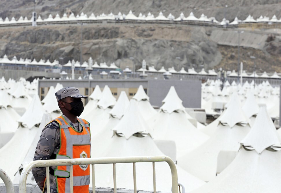 A Saudi soldier stands guard outside a tent camp in Mina, near the Muslim holy city of Mecca, Saudi Arabia on Sunday. Photo: AP