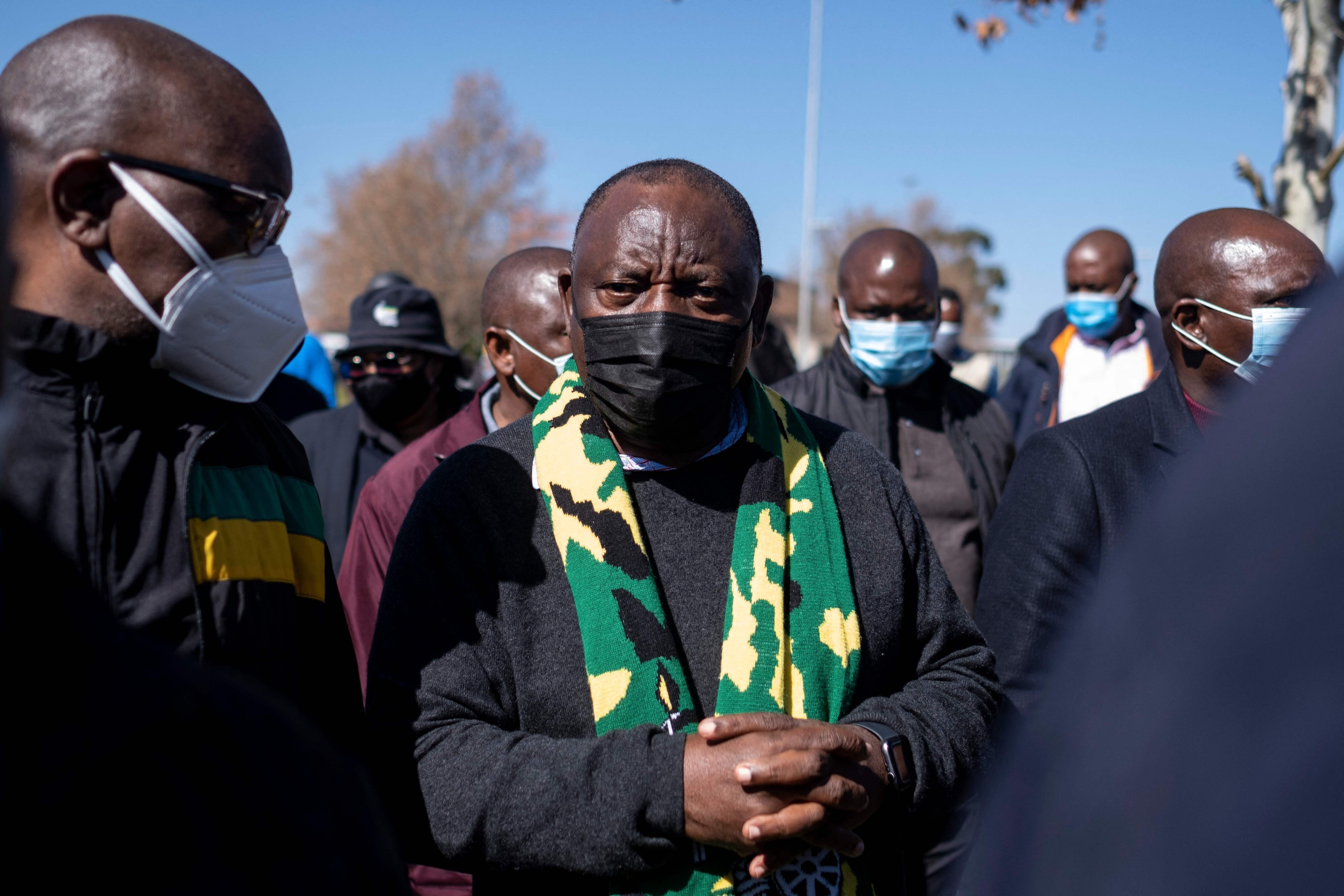 South African President Cyril Ramaphosa, centre, visits the Maponya mall on Sunday to discuss the damage caused by recent looting and destruction in Soweto. Photo: AFP