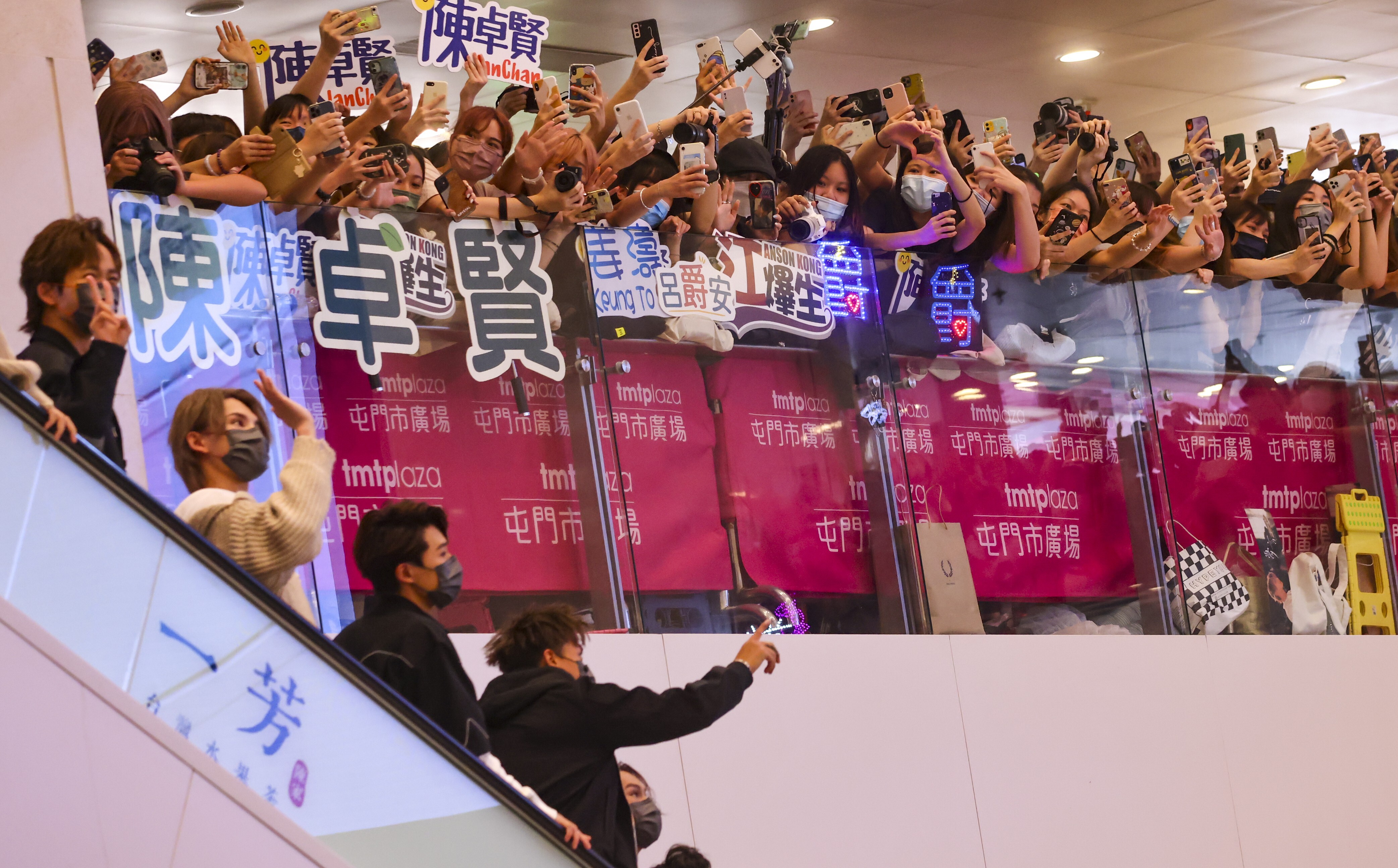 Rapturous cheers greet members of the boy bands Mirror and Error at a New Territories shopping centre. Photo: Dickson Lee