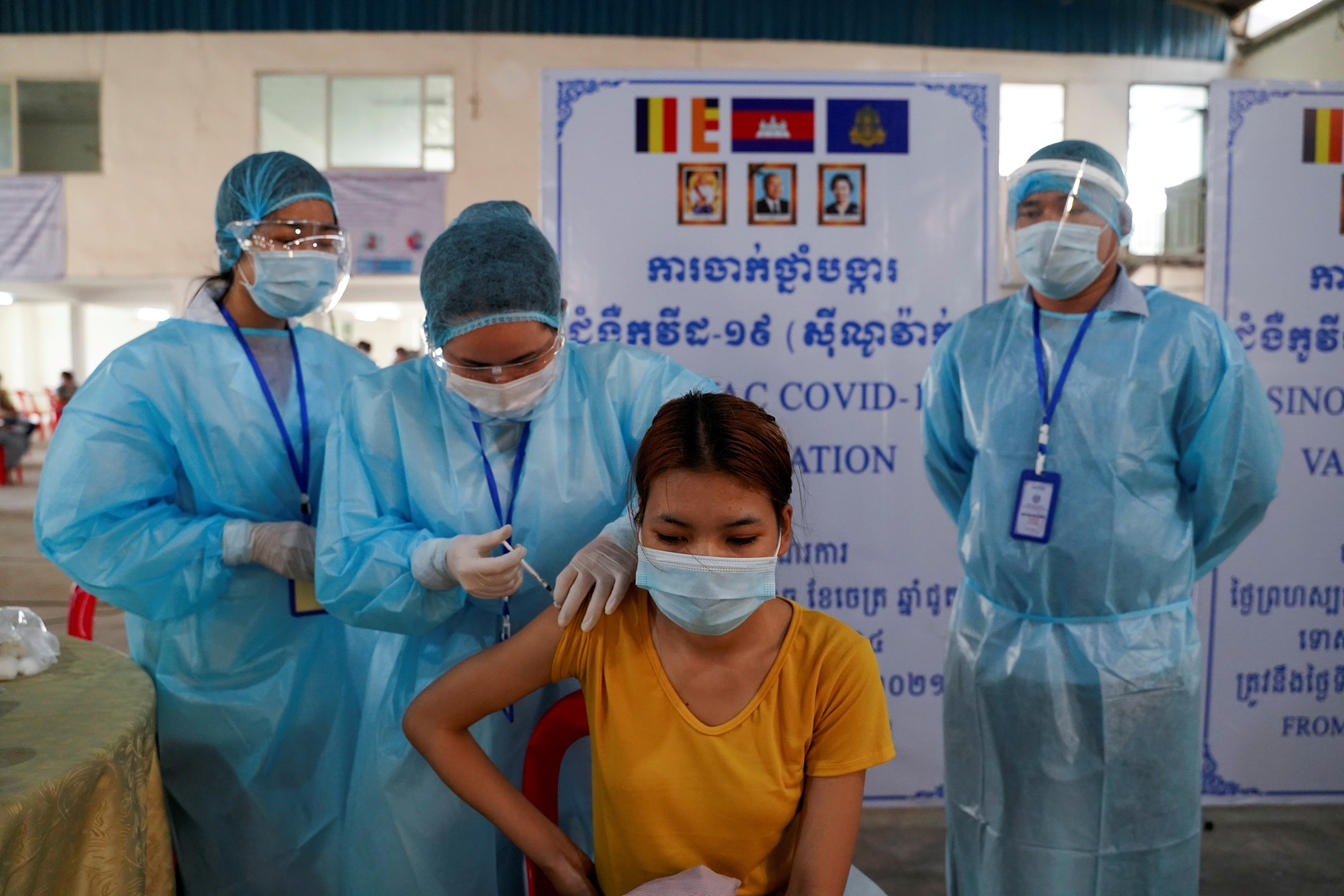 A garment factory worker receives a dose of Sinovac’s Covid-19 vaccine at an industrial park in Phnom Penh earlier this year. Photo: Reuters