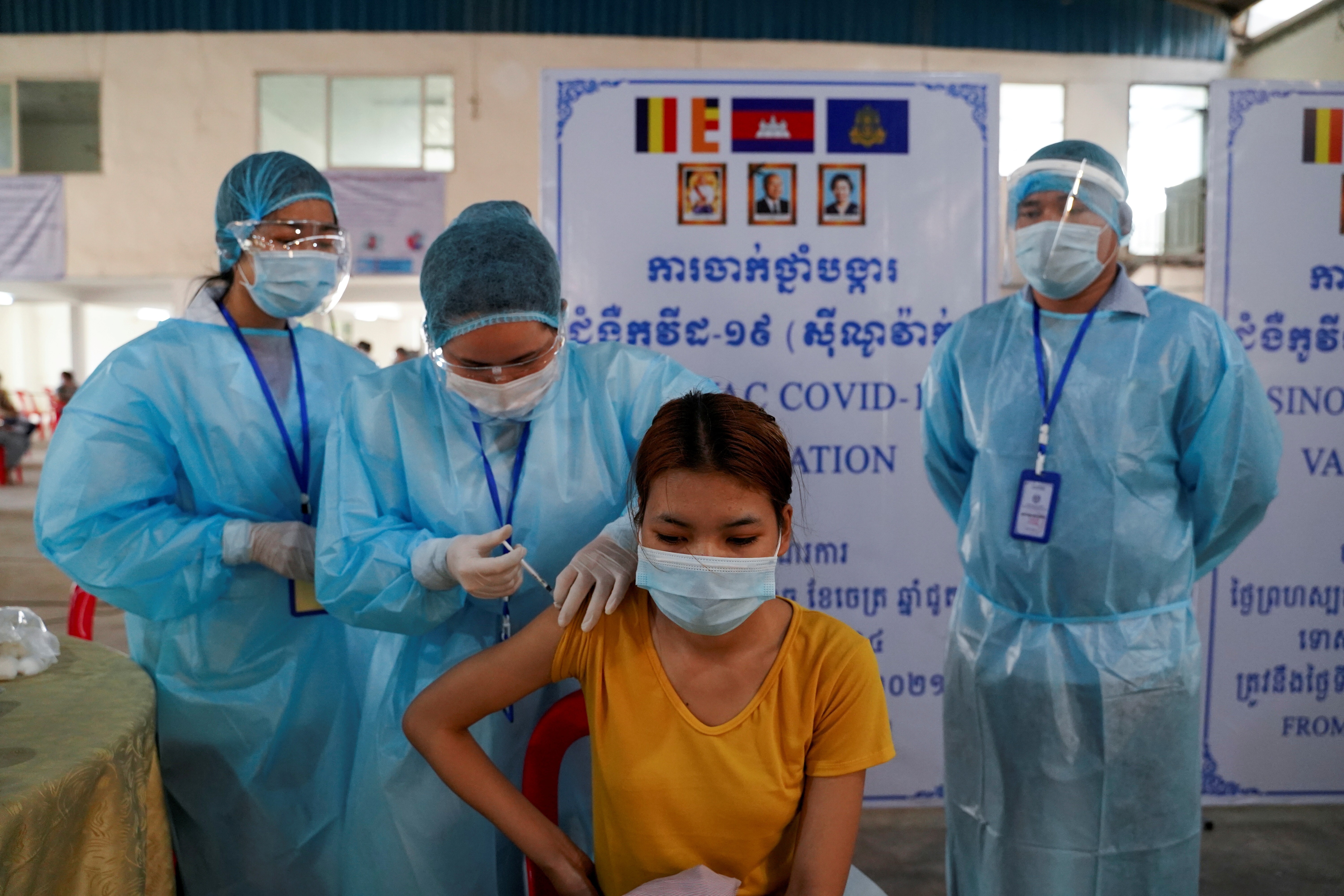 A garment factory worker receives a dose of Sinovac’s Covid-19 vaccine at an industrial park in Phnom Penh earlier this year. Photo: Reuters