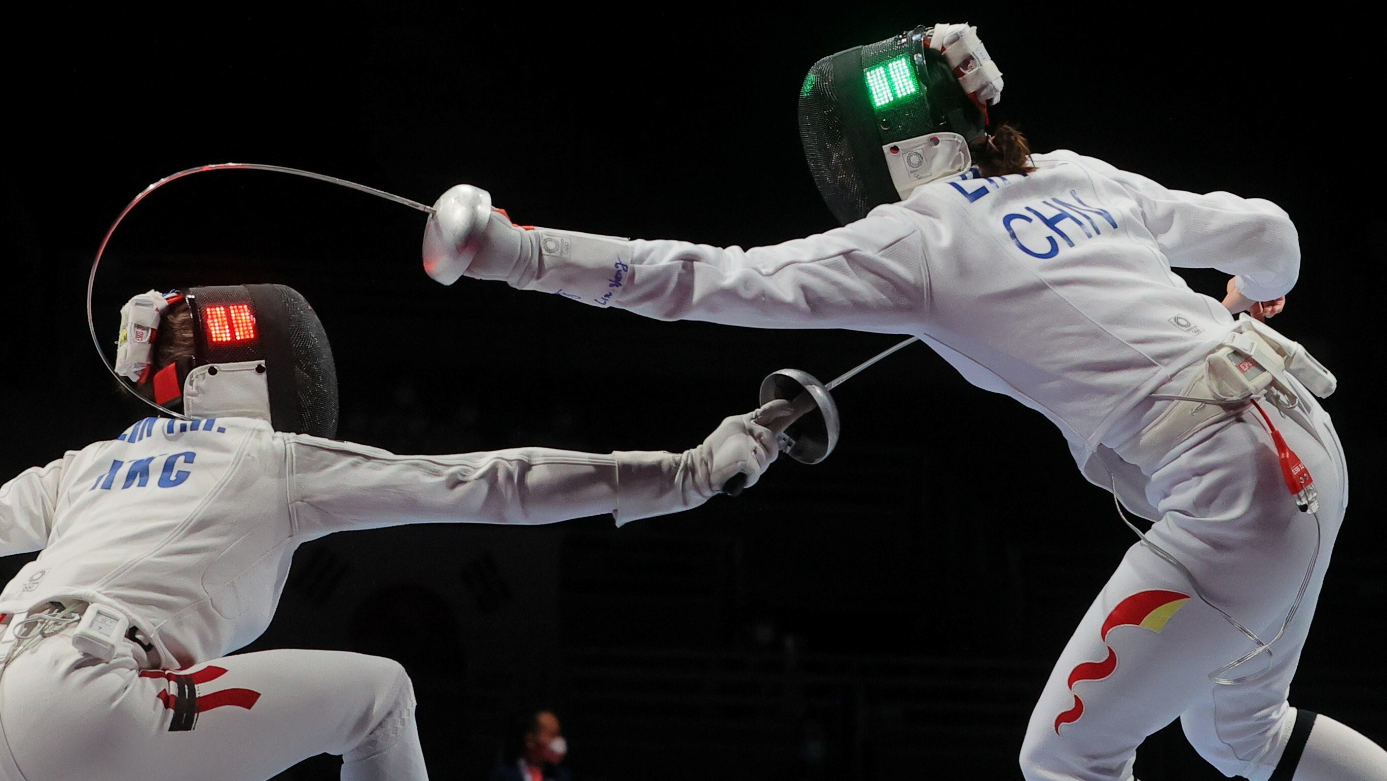 Hong Kong’s Coco Lin Yik-hei takes on China’s Lin Sheng in the women’s team épée at the Tokyo Olympics on Tuesday. Photo: REUTERS