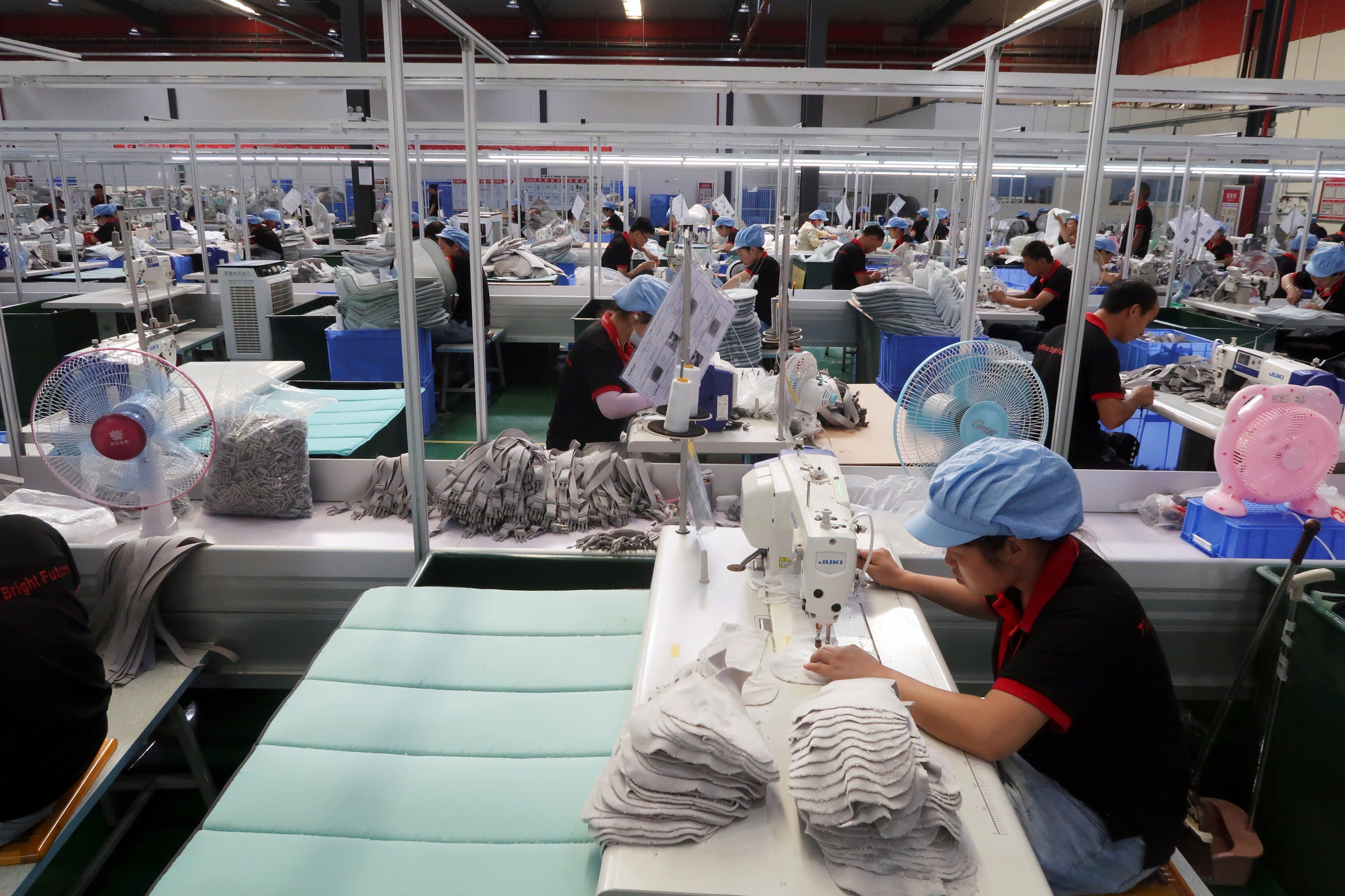 After China’s landmark accession to the World Trade Organization in 2001, private companies began to take over as the country’s dominant employers. Photo: Reuters