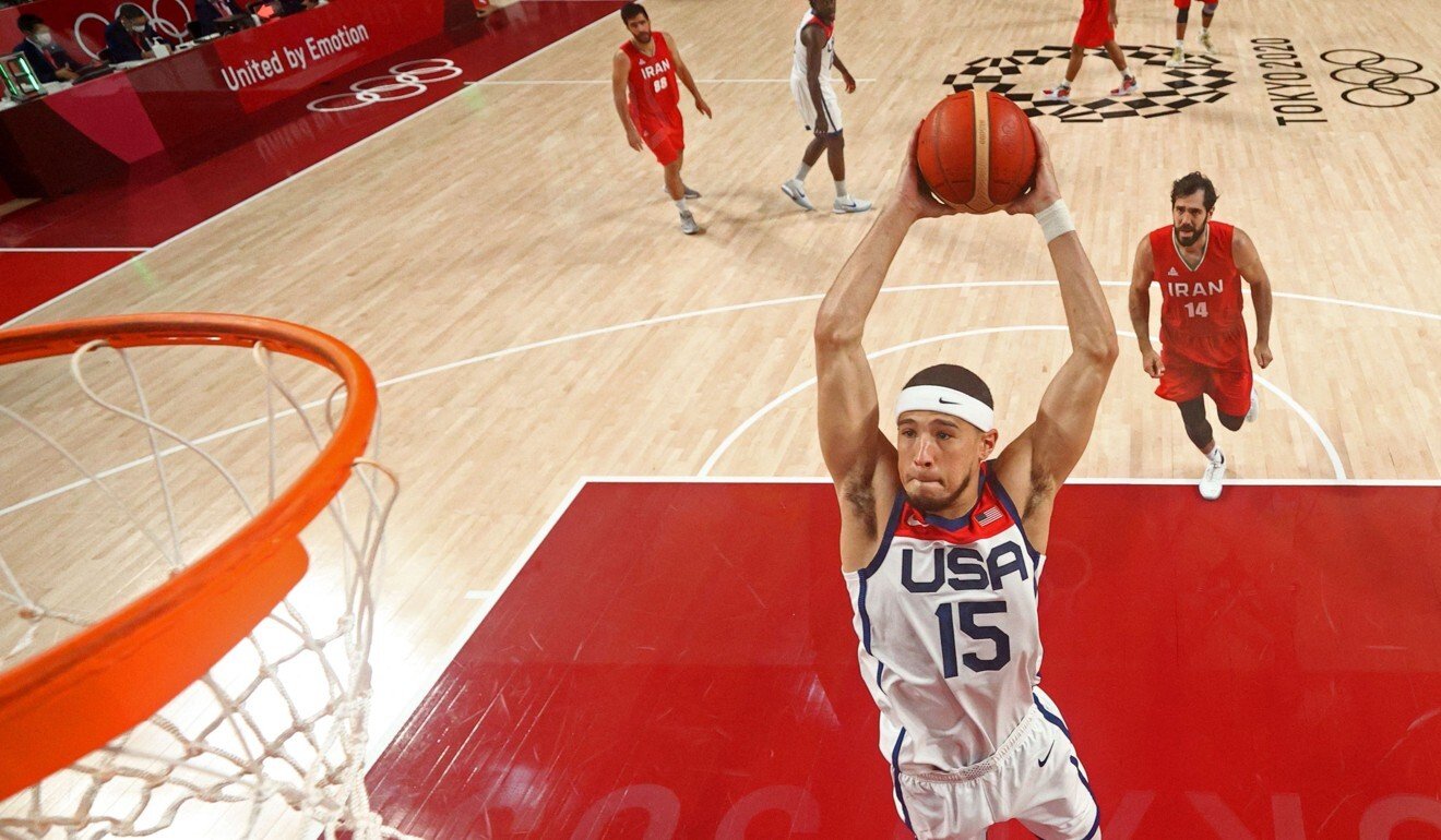 USA's Devin Booker goes to the basket. Photo: AFP