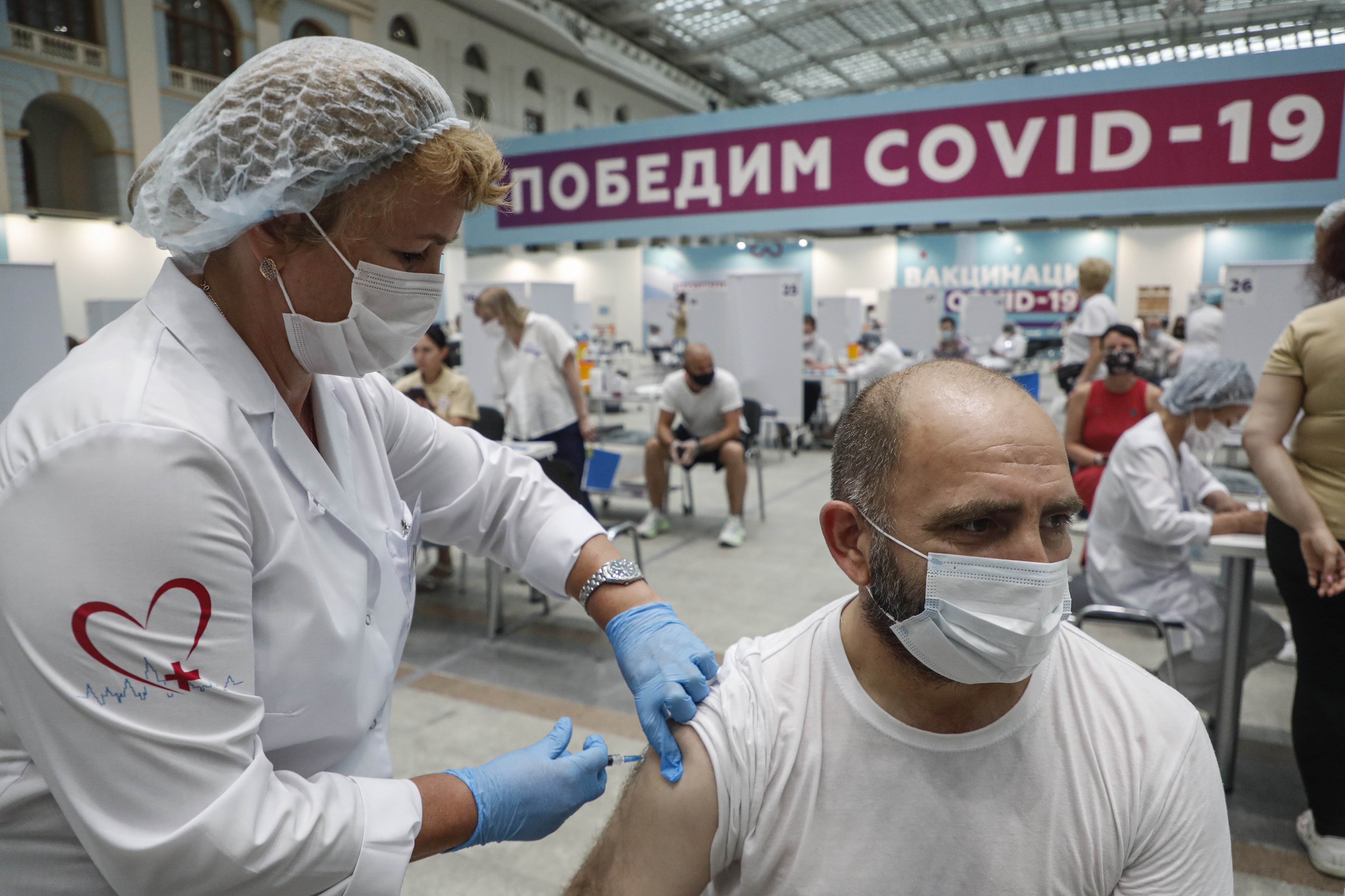A Russian man receives a shot of the Sputnik V vaccine in Moscow. Photo: EPA