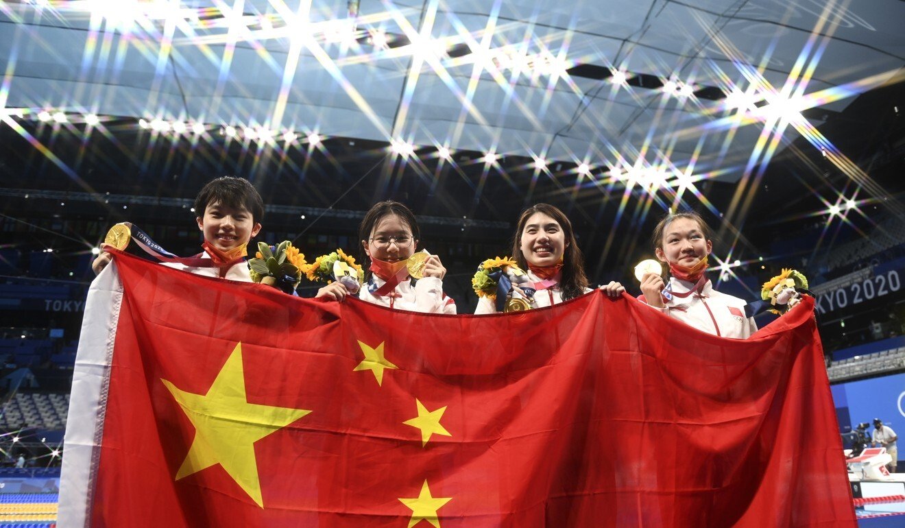 Yang Junxuan, Tang Muhan, Zhang Yufei and Li Bingjie after the medal ceremony of the women’s 4x200m freestyle relay. Photo: Xinhua