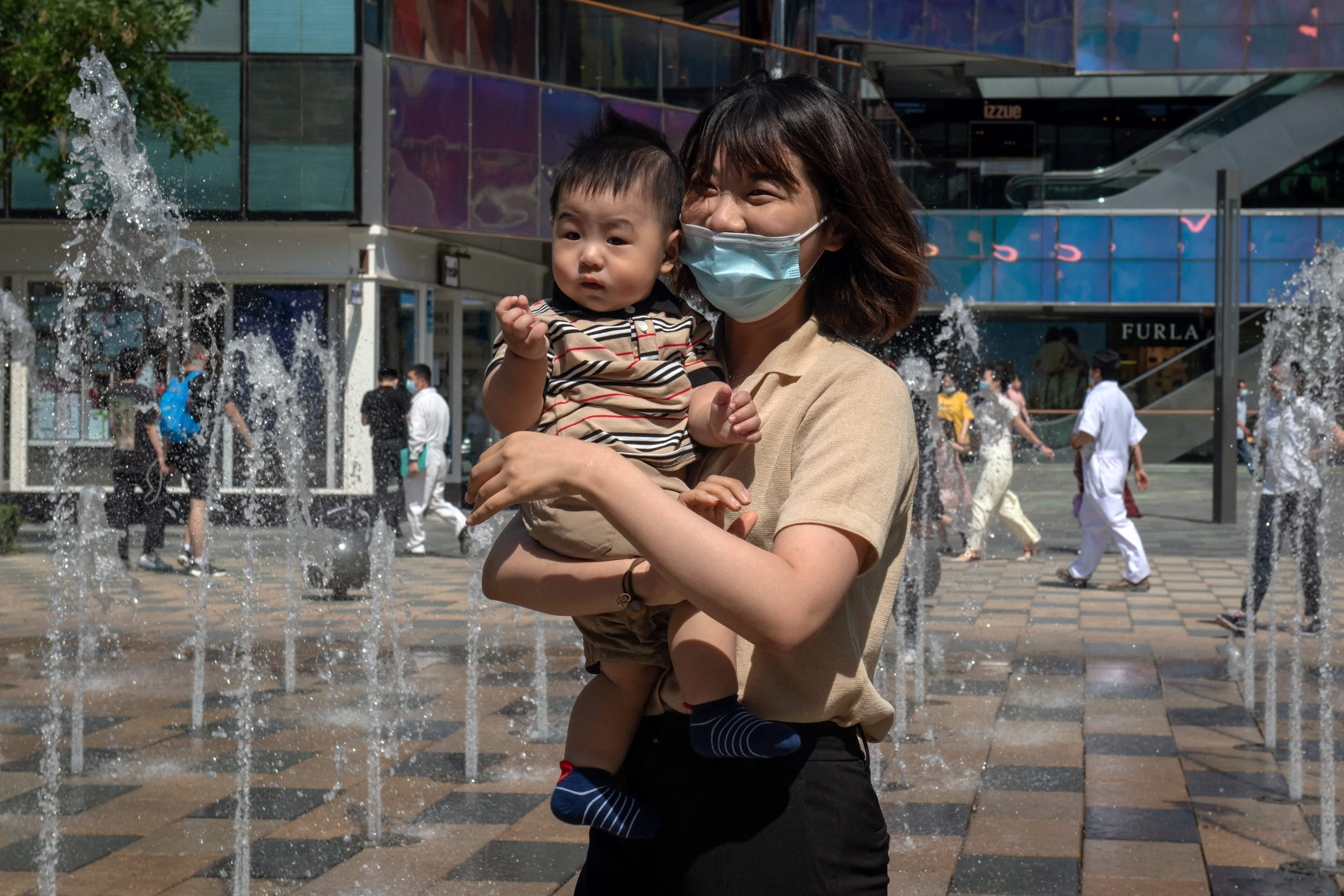 Structural and social barriers in Chinese society continue to challenge mothers in their quest to level the corporate playing field. Photo: AFP