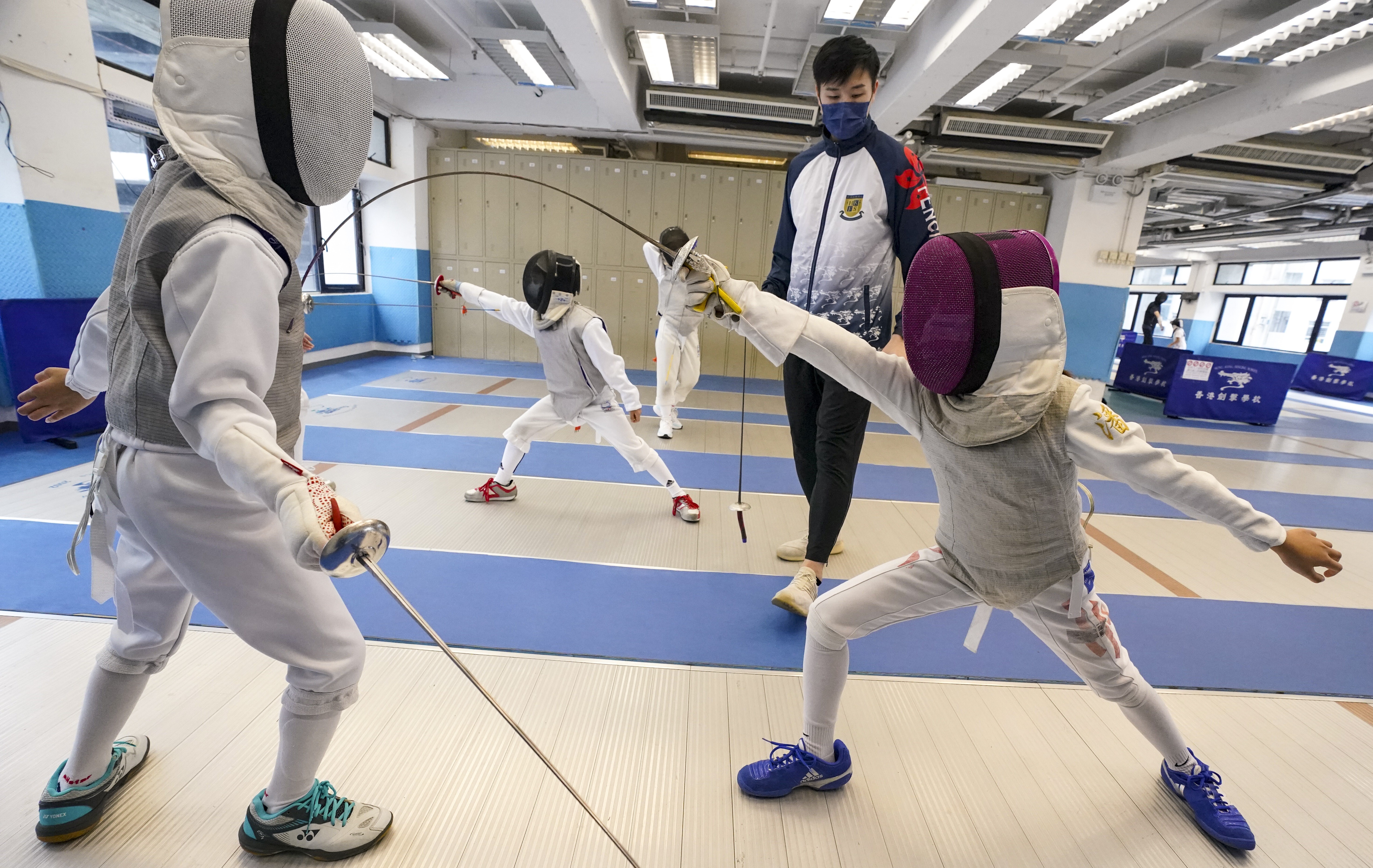 Phones have been very busy at Hong Kong’s fencing schools since Edgar Cheung’s gold medal performance. Photo: Felix Wong