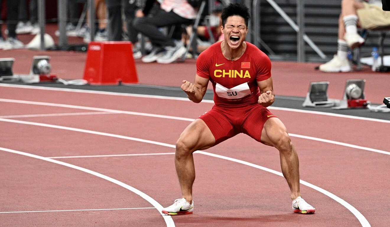 China‘s Su Bingtian celebrates after winning his men’s 100m semi-final. Photo: AFP