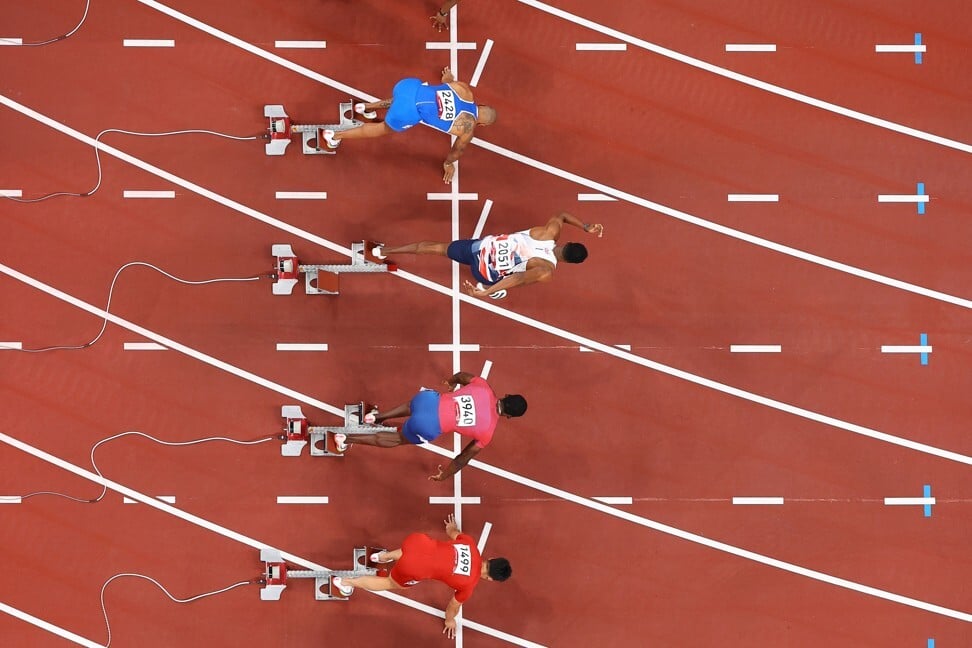 Zharnel Hughes of Britain makes a false start. Photo: Getty Images