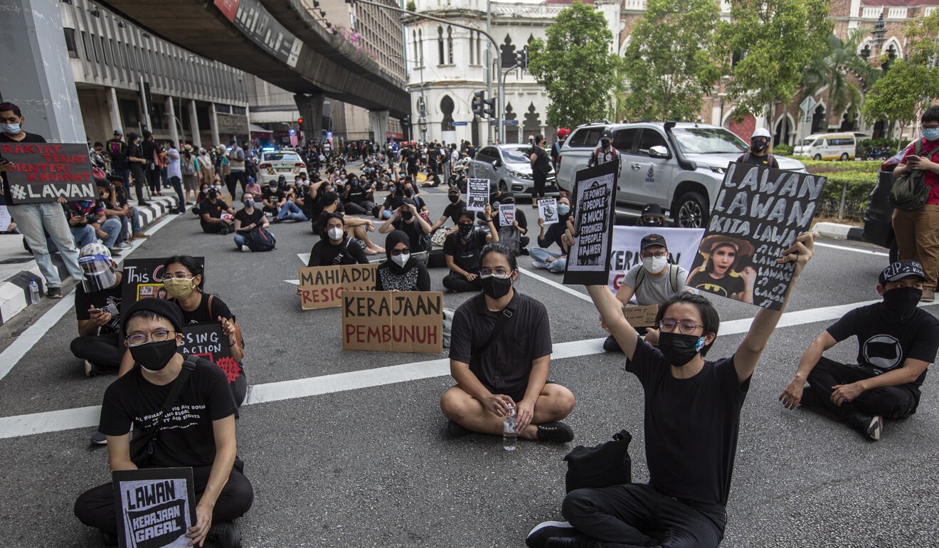 Protesters at a July 31 rally against the Muhyiddin administration. Photo: EPA-EFE