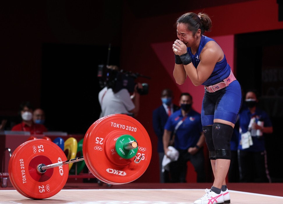 Hidilyn Diaz celebrates after the women's 55kg weightlifting event. Photo: Xinhua